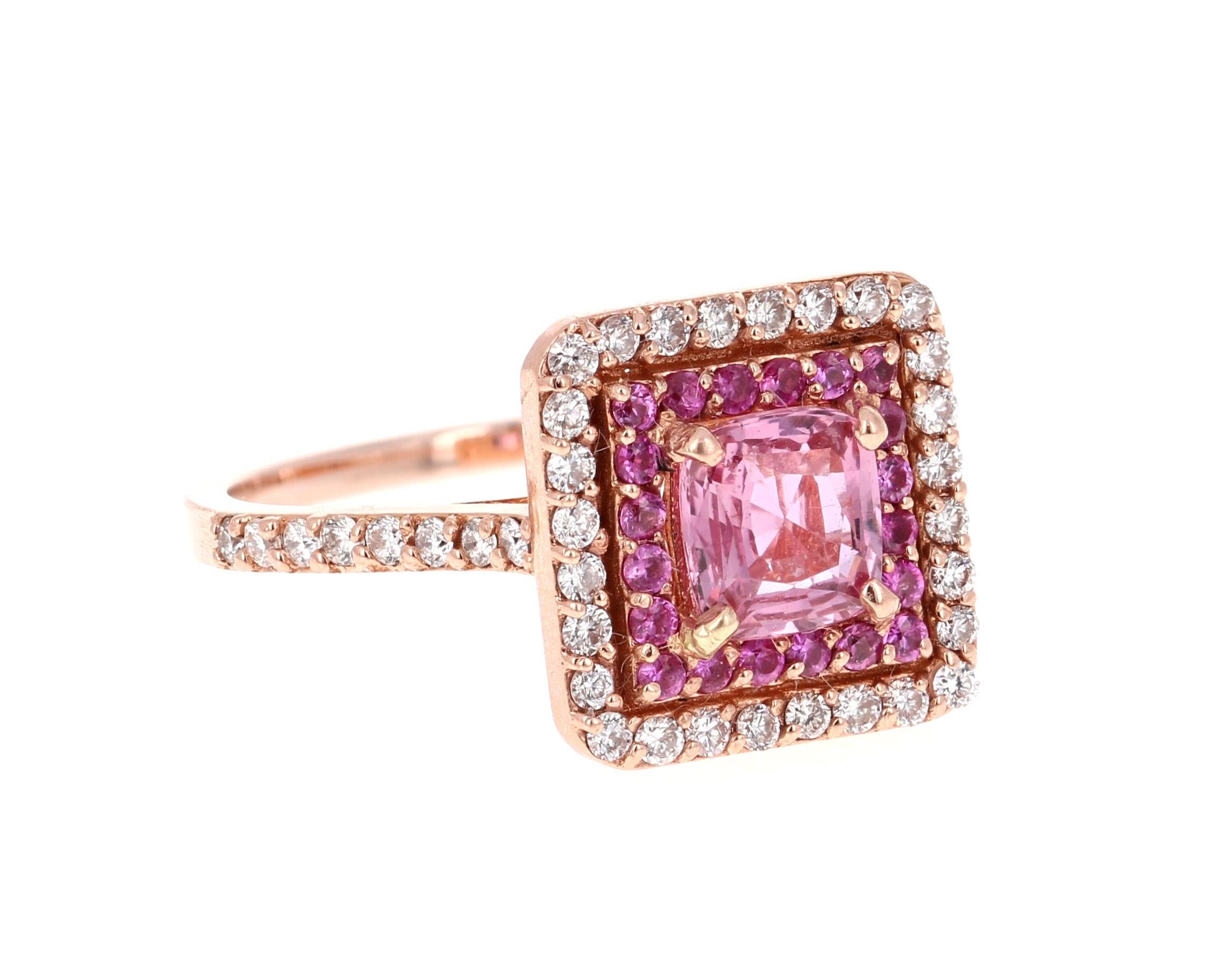 Simply the most elegant and beautiful Pink Sapphire and Diamond Engagement or Wedding Ring!

The center Cushion Cut Pink Sapphire is 1.02 Carats and is surrounded by a halo of 20 Pink Sapphires that weigh 0.23 Carats, followed by another halo of 44