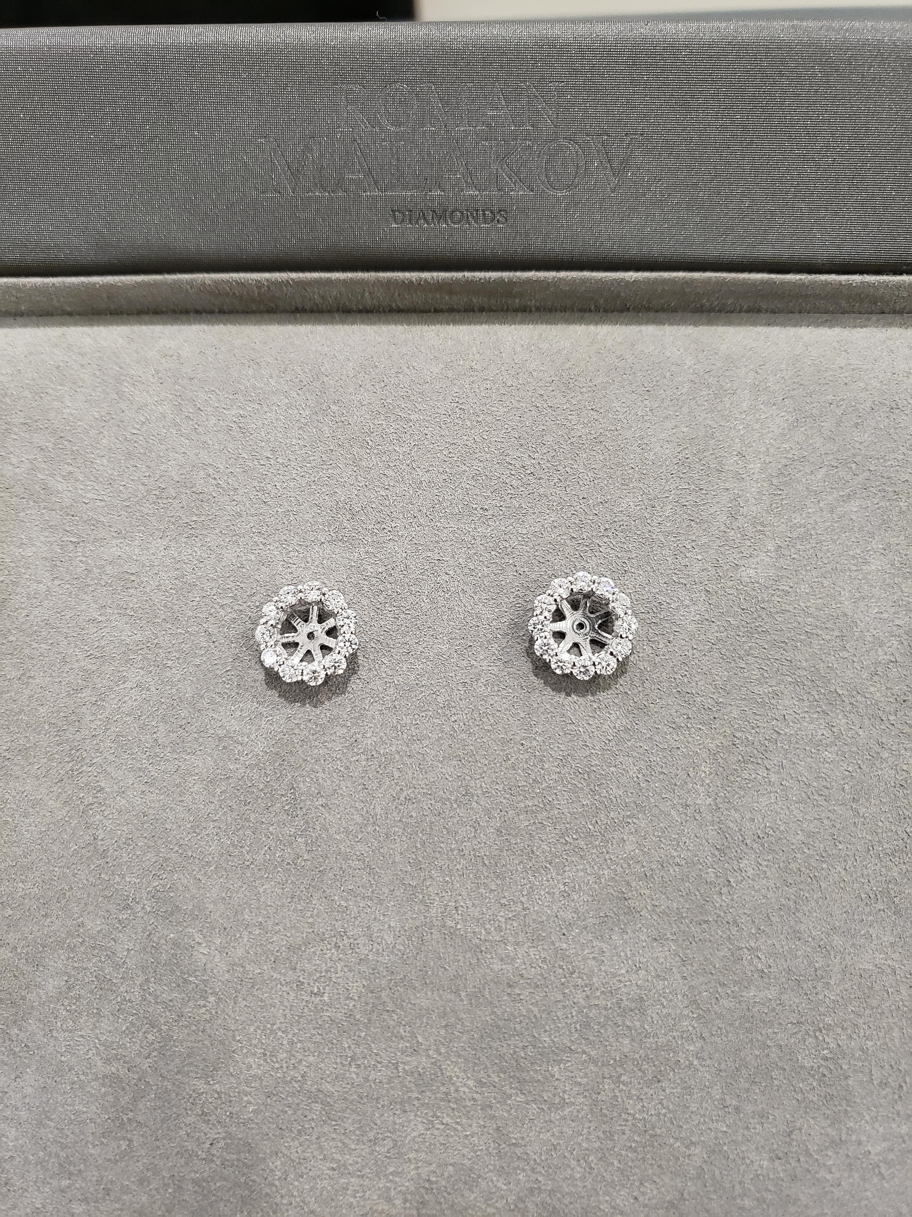 Earring jackets showcasing 1.68 carats total of round brilliant diamonds. Each jacket can be set with 1.50 - 2.00 carat diamond. Set in an 18 karat white gold mounting. 

Pictured with a 1.62 carat round diamond (sold separately).

We can make these