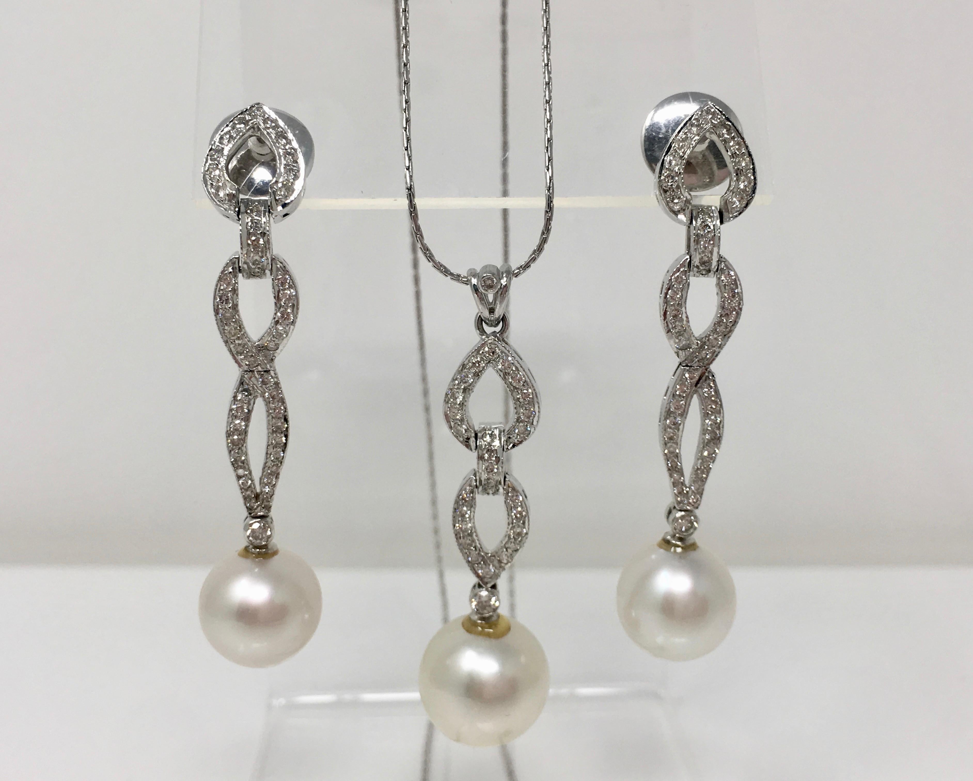 This fabulous white round brilliant diamond weighing 1.68 carat with VS clarity and GH color and white south sea pearls three piece pendant set includes a diamond pendant  suspended from the 18k white gold chain and a pair of earrings . The length