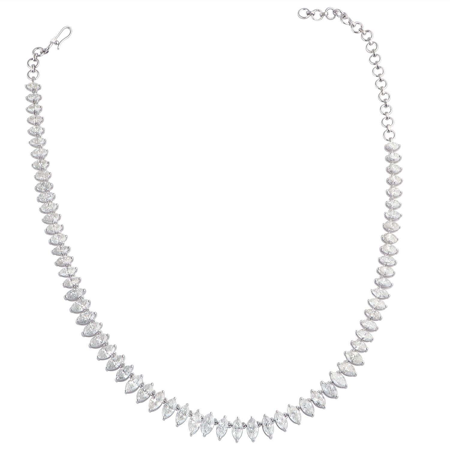 The necklace is designed to be worn as a charm necklace, with each diamond charm hanging gracefully from the chain. This design allows for movement and adds an element of playfulness to the piece. The adjustable chain length ensures a perfect fit,