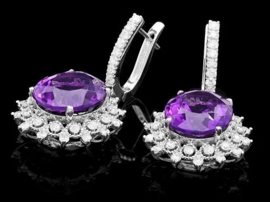 16.80ct Natural Amethyst and Diamond 14K Solid White Gold Earrings

Total Natural Oval Amethyst Weight: 14.90 Carats 

Amethyst Measures: Approx.  15 x 12 mm

Total Natural Round Cut White Diamonds Weight: Approx.  1.90 Carats (color G-H / Clarity