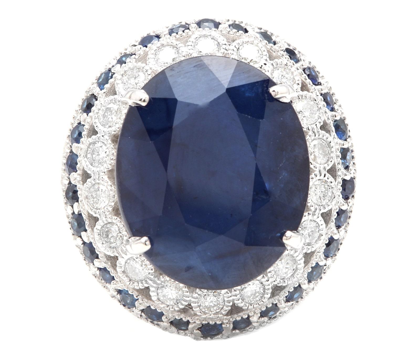 16.80 Carats Exquisite Natural Blue Sapphire and Diamond 14K Solid White Gold Ring

Suggested Replacement Value $6,500.00

Total Blue Sapphire Weight is: Approx. 16.00 Carats (Diffused Treated)

Sapphire Measures: Approx. 16.00 x 13.00mm

Natural