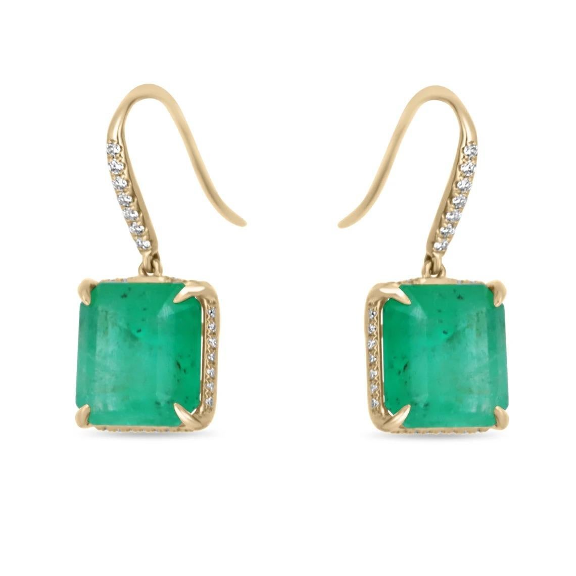 A stylish pair of natural Colombian emerald JUMBO cut-emerald & diamond hook earrings hand made in solid 18K yellow gold. The chic pair of earrings feature dark medium green, genuine ethically mined Colombian emeralds. The rare large emeralds are