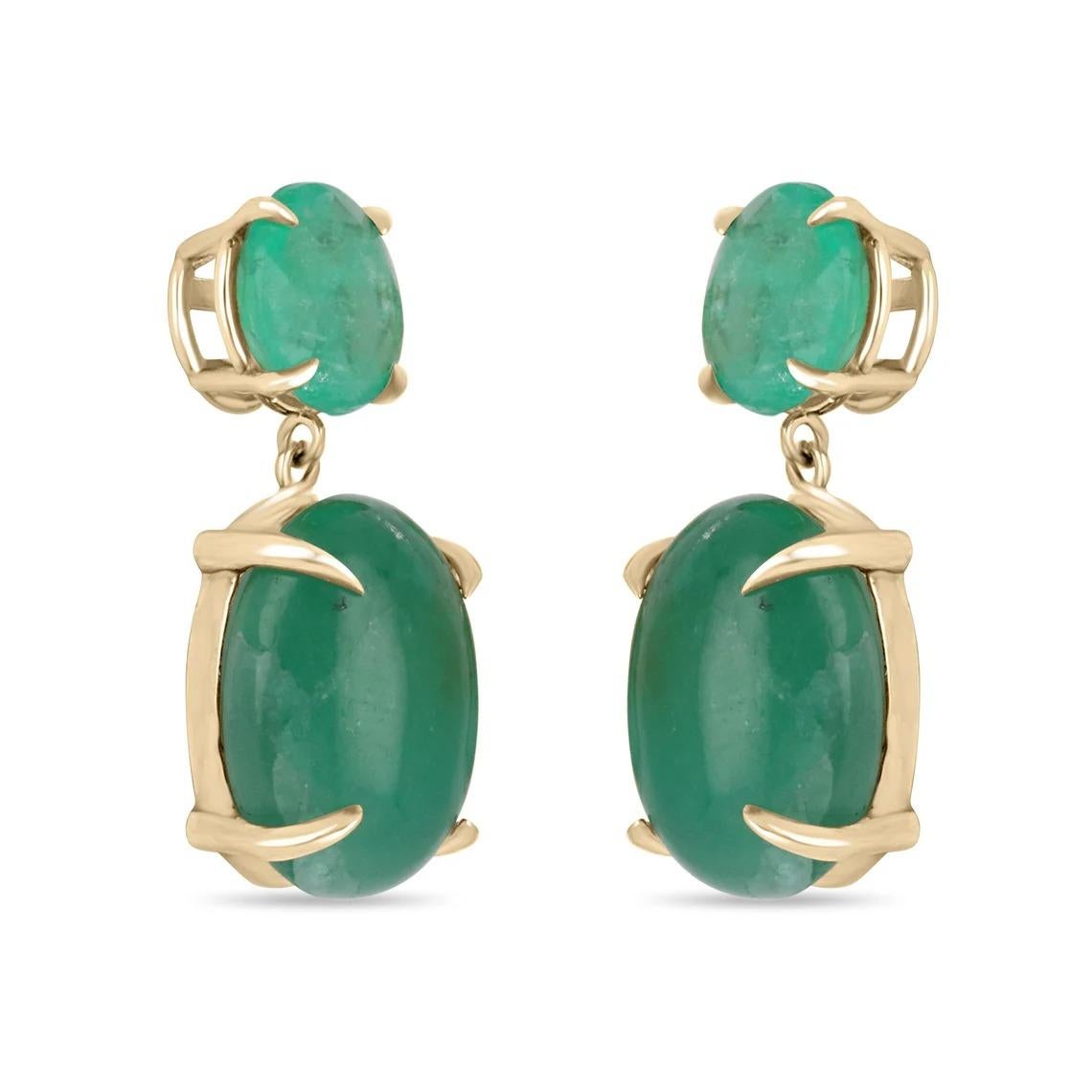 Featuring here is a marvelous set of large statement size round Colombian emerald and oval cabochon dangling studs in fine 14K yellow gold. Displayed are medium-rich green Round and Oval cut emeralds with very good transparency, accented by a simple