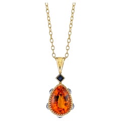 16.85 Carat Madeira Citrine Pear, Blue Sapphire, White and Yellow Gold Pendant