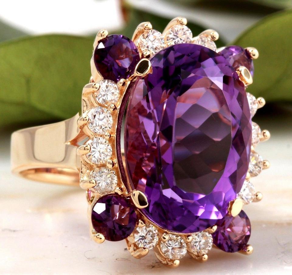 16.85 Carats Natural Amethyst and Diamond 14K Solid Yellow Gold Ring

Suggested Replacement Value:  $6,700.00

Total Natural Oval Shaped Amethyst Weights: Approx.  16.00 Carats 

Natural Round Diamonds Weight: Approx.  0.85 Carats (color G-H /