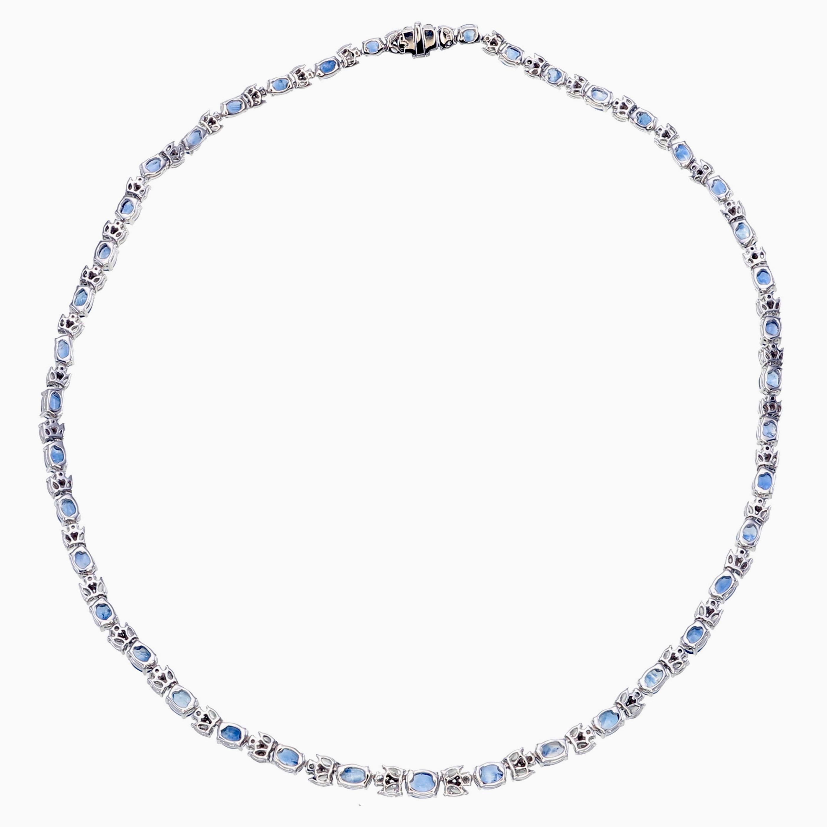 This unique vibrant Kashmir Blue Sapphire and diamond necklace designed and crafted by Rewa jewels in 18 karat white gold.
The necklace is studded with 42 pieces of Kashmir Blue sapphire oval shaped  weighing approximately 16.86 carat in all.