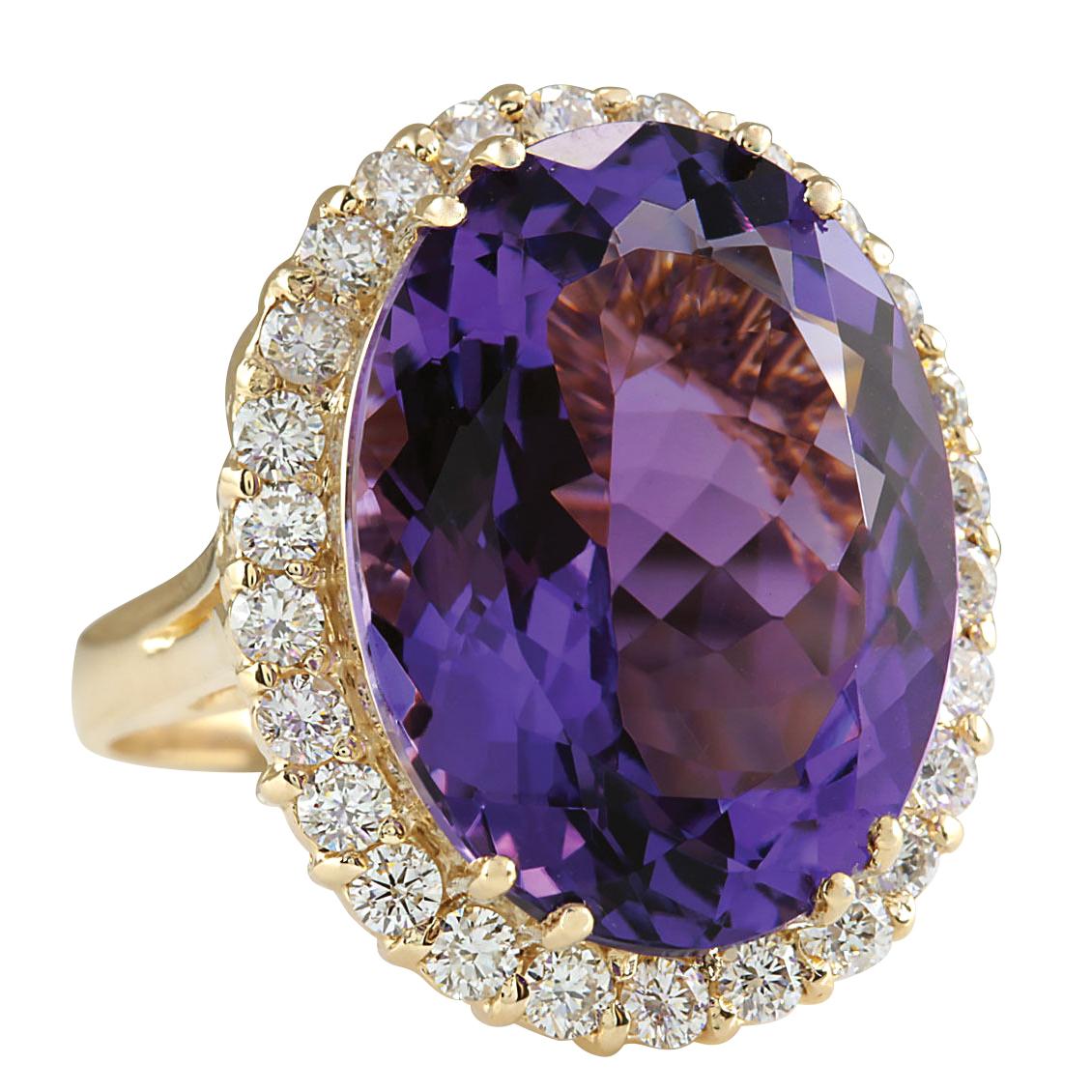 Stamped: 14K Yellow Gold
Total Ring Weight: 8.5 Grams
Total Natural Amethyst Weight is 15.66 Carat (Measures: 20.00x15.00 mm)
Color: Purple
Total Natural Diamond Weight is 1.20 Carat
Color: F-G, Clarity: VS2-SI1
Face Measures: 24.05x19.75 mm
Sku: