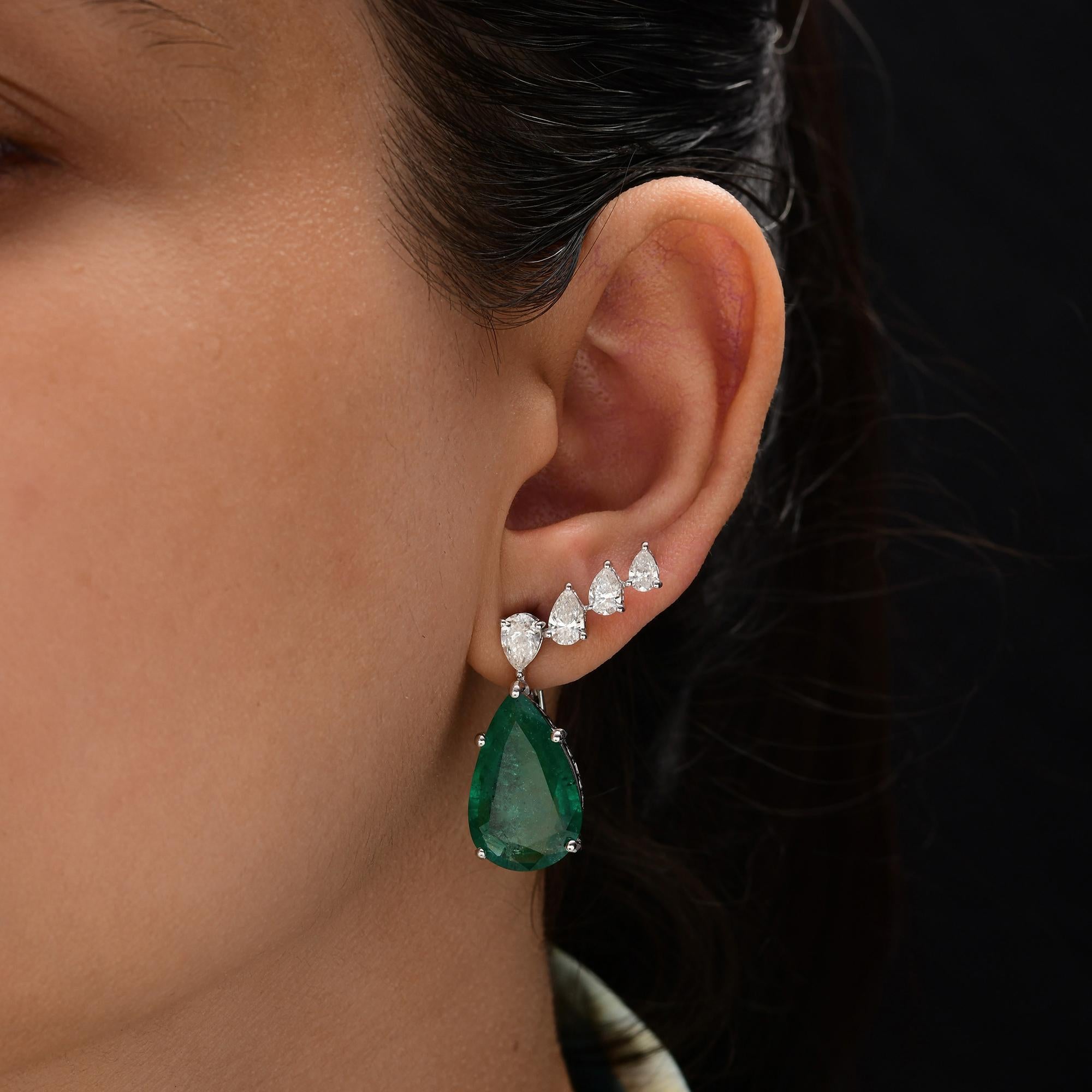 Cast from 14-karat gold, these exquisite earrings are handset with 16.86 carats of emerald & 2.67 carats of sparkling diamonds. Emerald is a May birthstone and is believed to improve intellect and attract prosperity. A wonderful gift for Mom,