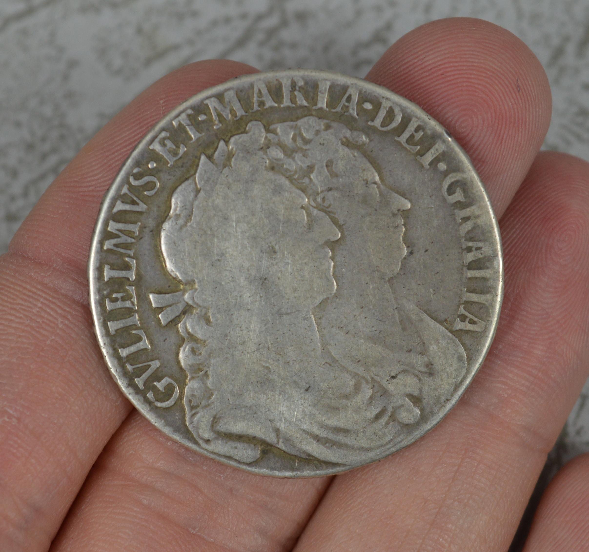 A superb William and Mary period Half Crown.

1689.

Almost very fine. Attractive toning.