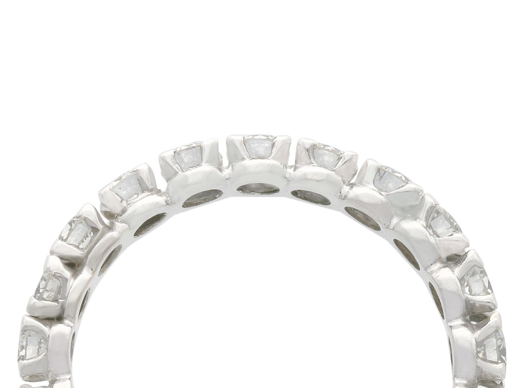A stunning, fine, and impressive 1.68 carat diamond and platinum full eternity ring; part of our diverse vintage estate jewelry collections.

This fine and impressive vintage eternity ring has been crafted in platinum.

The full eternity ring is