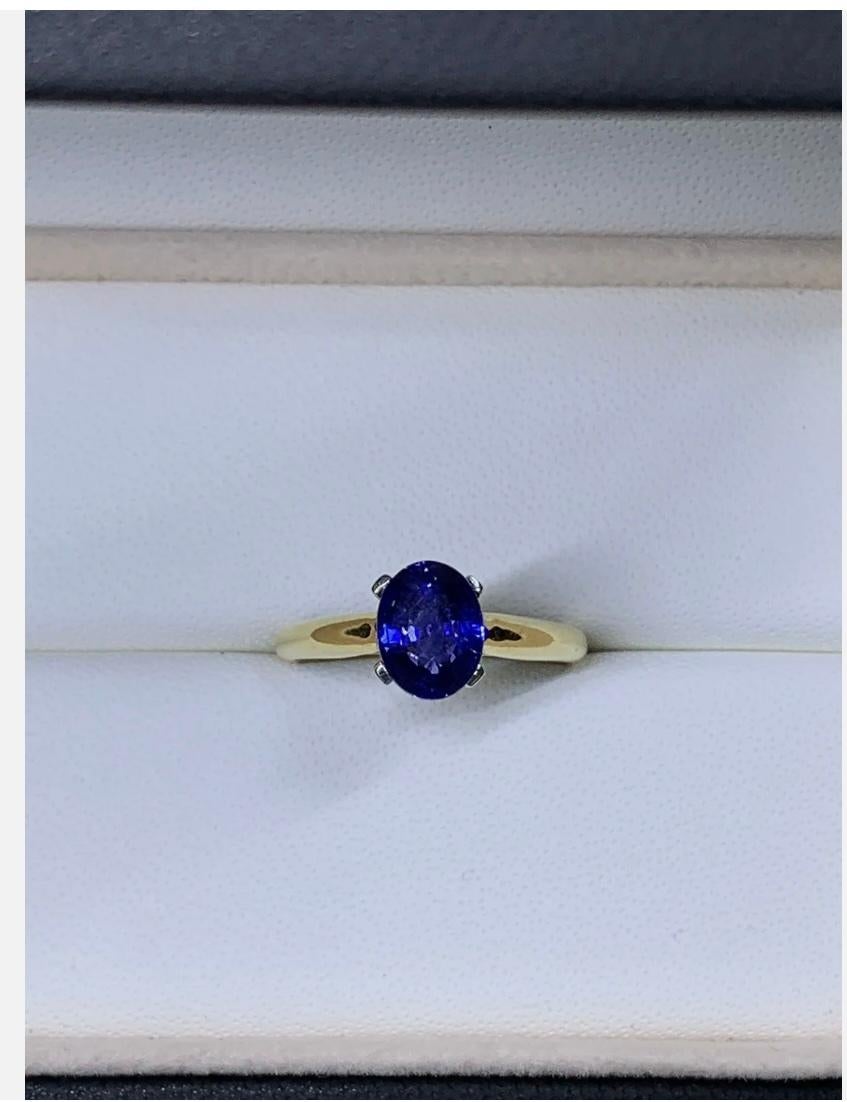 1.68ct Sapphire Royal Ceylon Solitaire Engagement Ring In 18ct Yellow Gold
This exquisite 18ct yellow gold ring features a stunning oval-shaped blue sapphire from Royal Ceylon, weighing in at 1.68ct. The solitaire setting style exudes elegance and