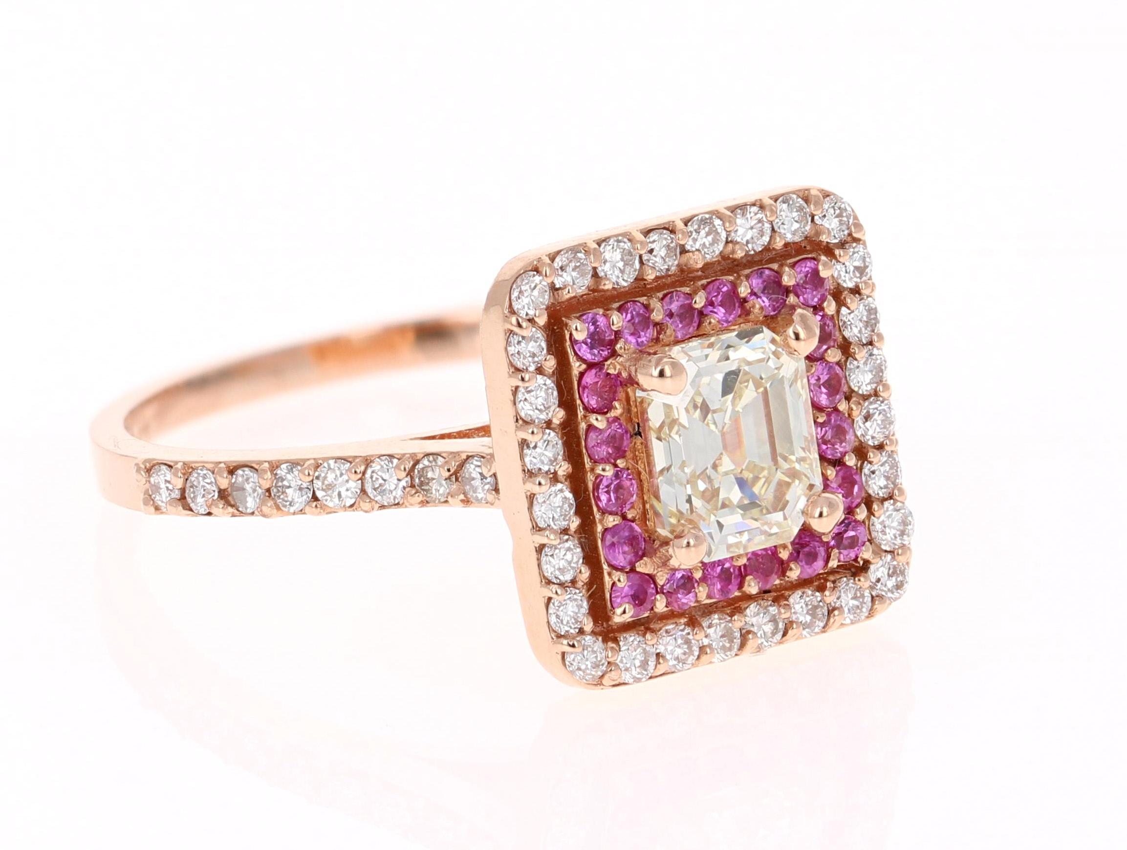 This elegant Engagement Ring has a 1.03 Carat Asscher Cut Diamond and is surrounded by 20 Pink Sapphires that weigh 0.23 Carats and is further surrounded by 44 Round Cut Diamonds that weigh 0.43 Carats. The clarity and color of the diamonds in the