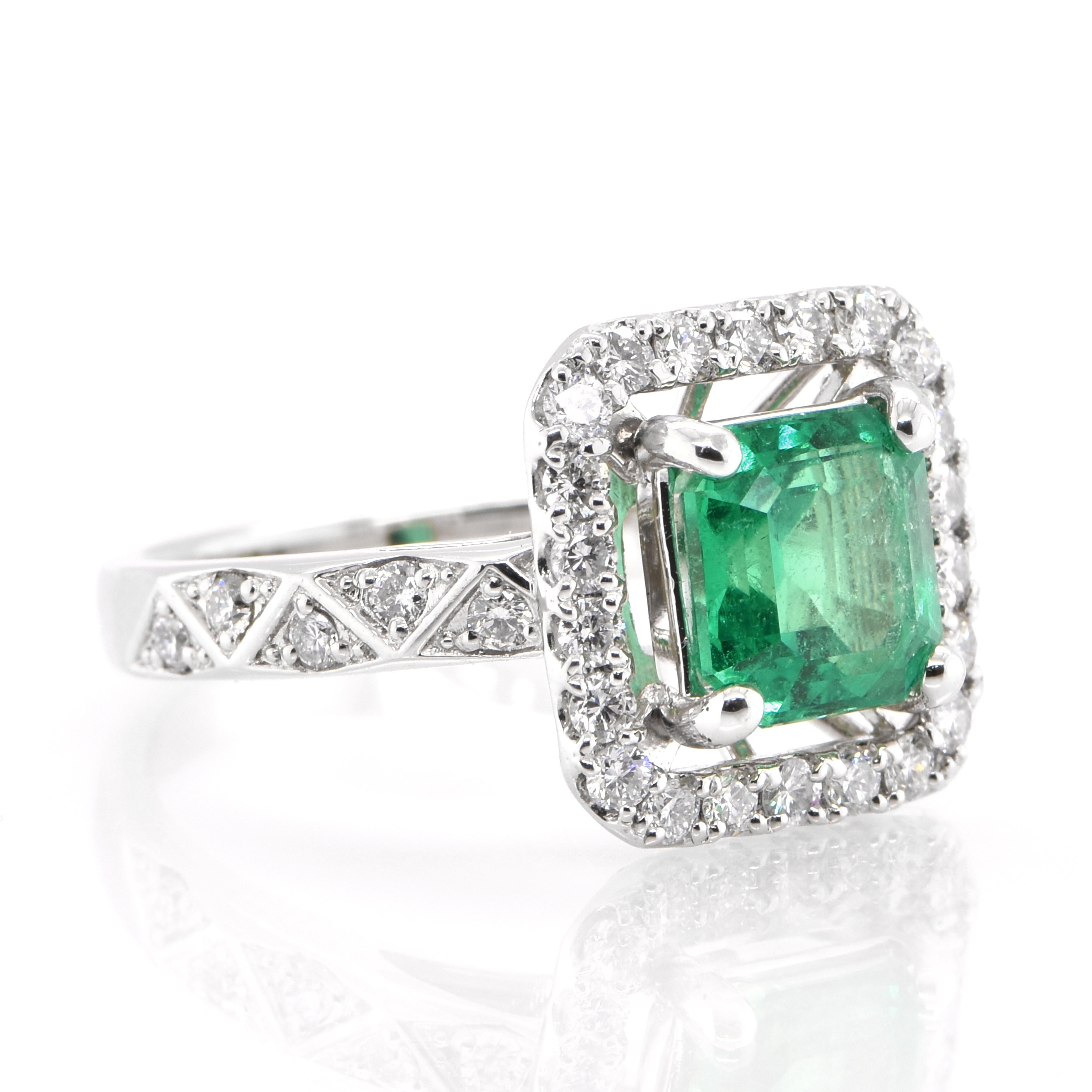 Modern 1.69 Carat Natural Emerald and Diamond Ring Set in Platinum For Sale