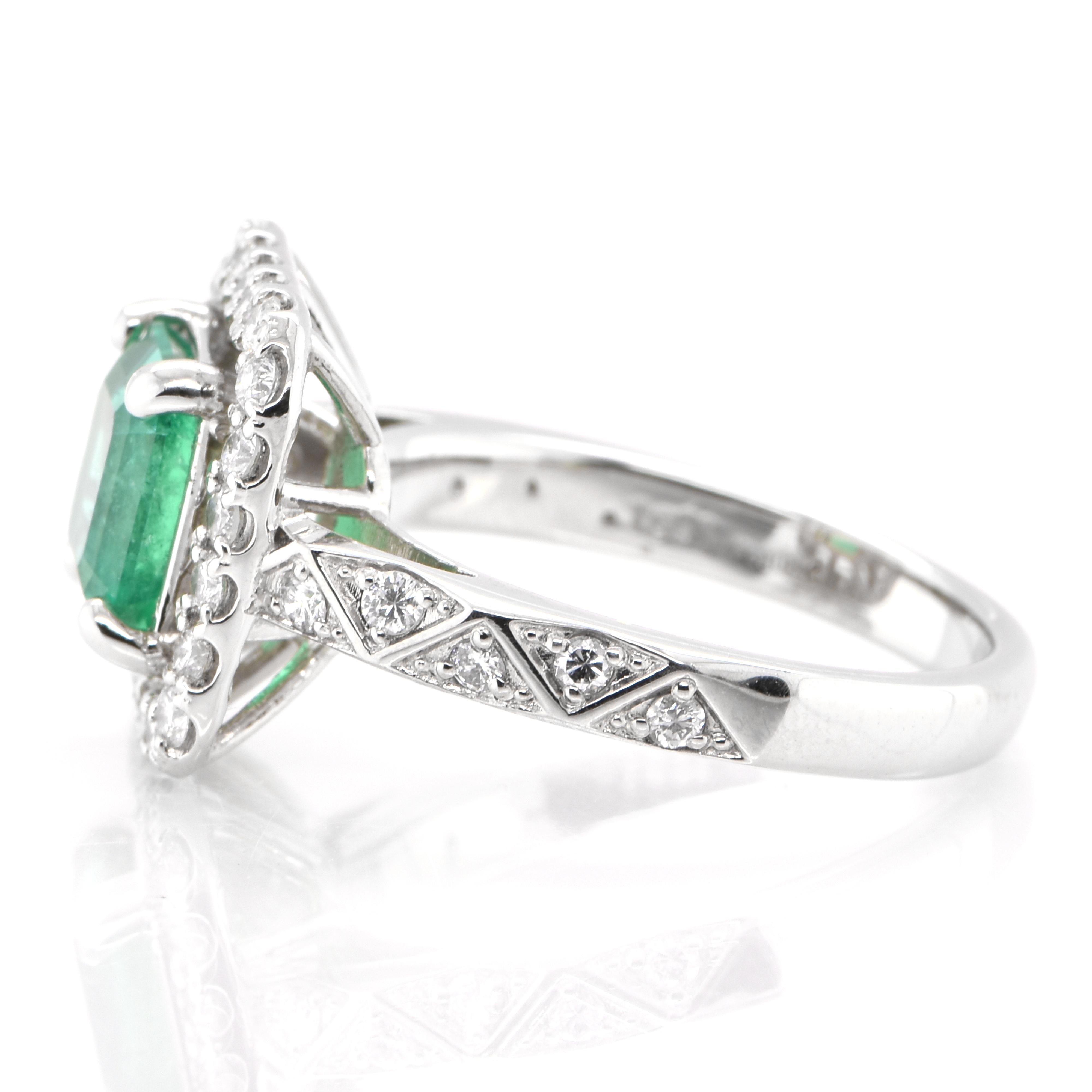 Emerald Cut 1.69 Carat Natural Emerald and Diamond Ring Set in Platinum For Sale