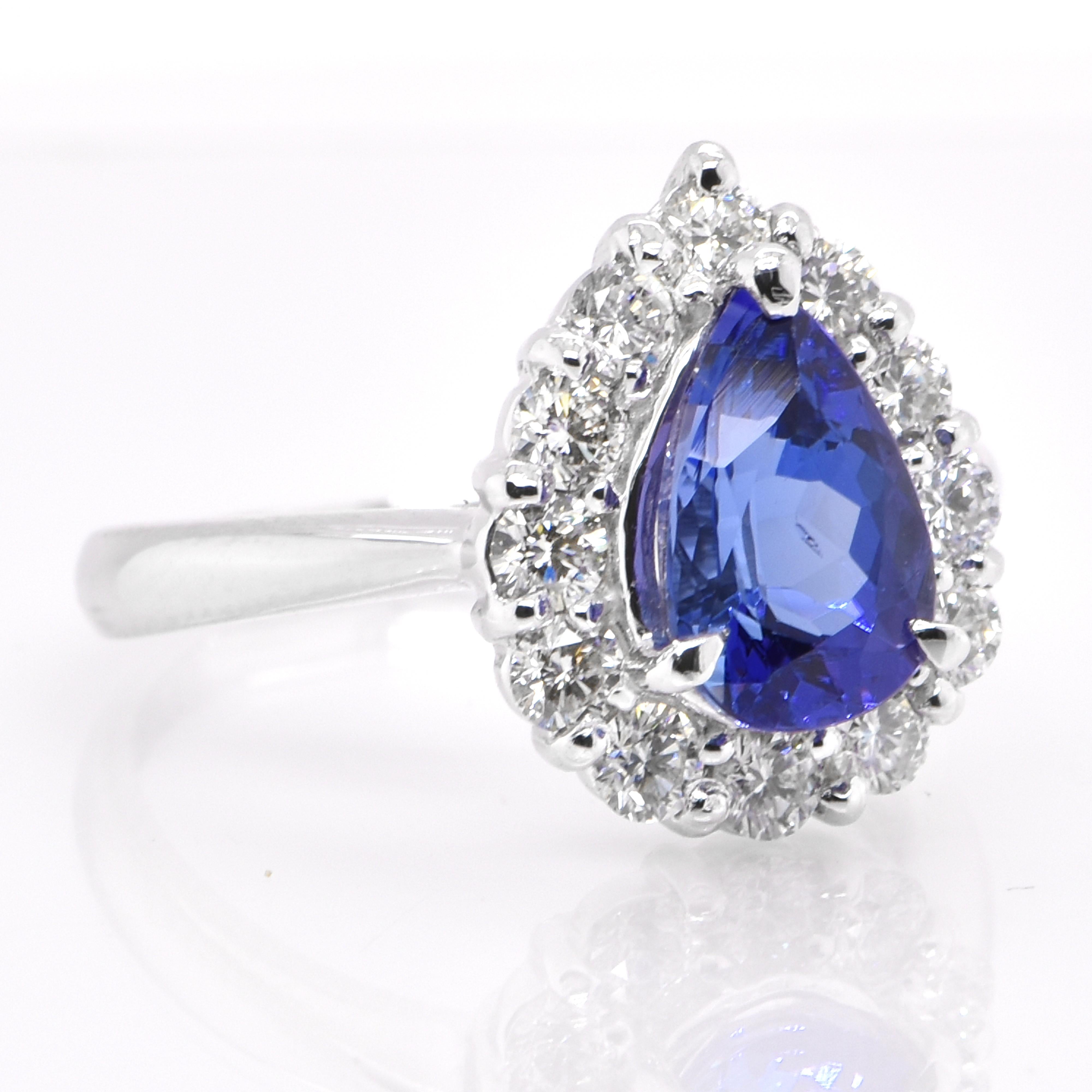 Modern 1.69 Carat Natural Pear Cut AAA+ Tanzanite and Diamond Ring Set in Platinum For Sale