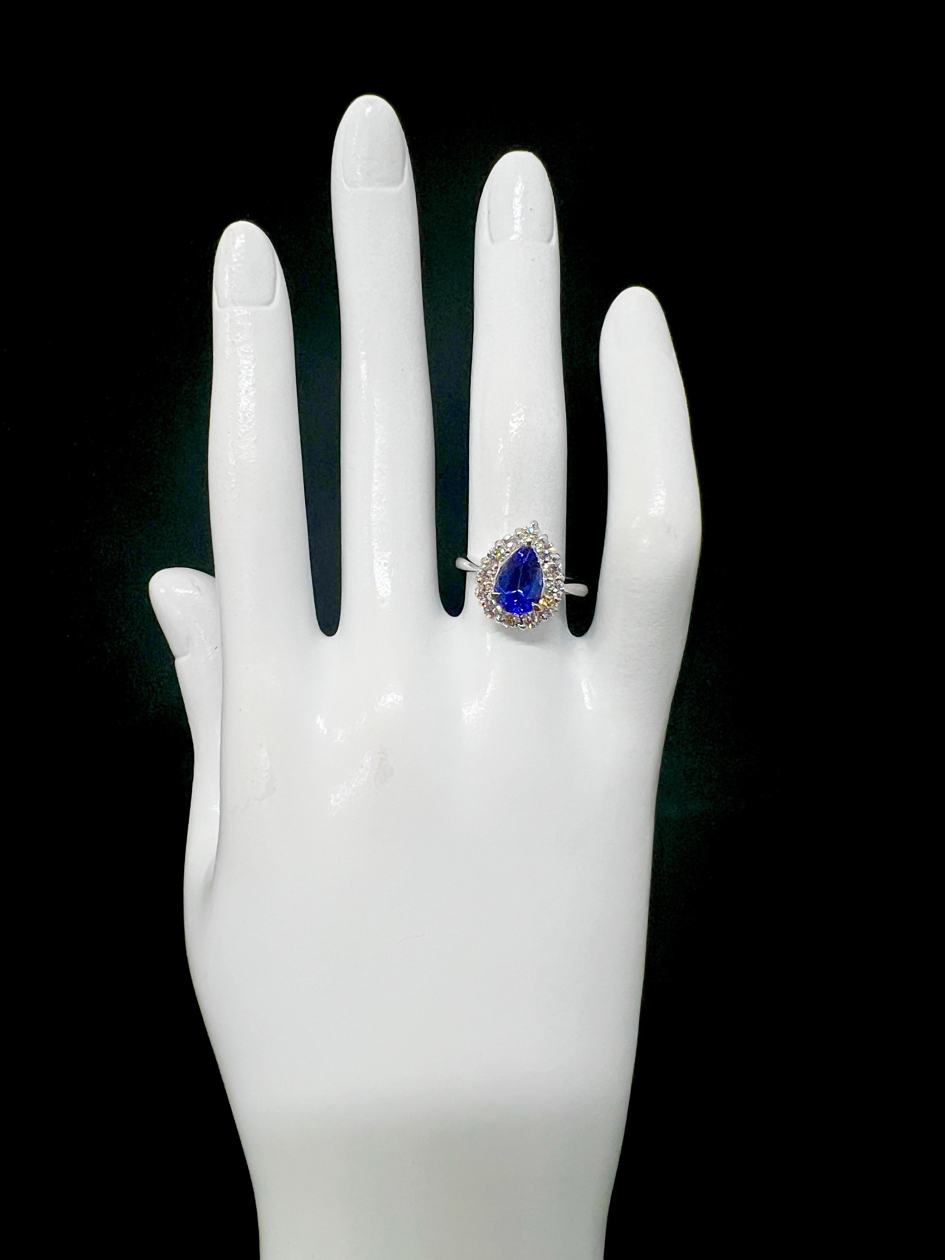 1.69 Carat Natural Pear Cut AAA+ Tanzanite and Diamond Ring Set in Platinum For Sale 2