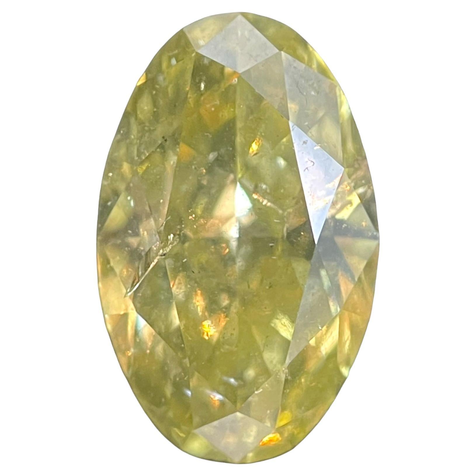 1.69 Carat Oval Brilliant GIA Certified Fancy Intense Yellow Color I1 Clarity For Sale