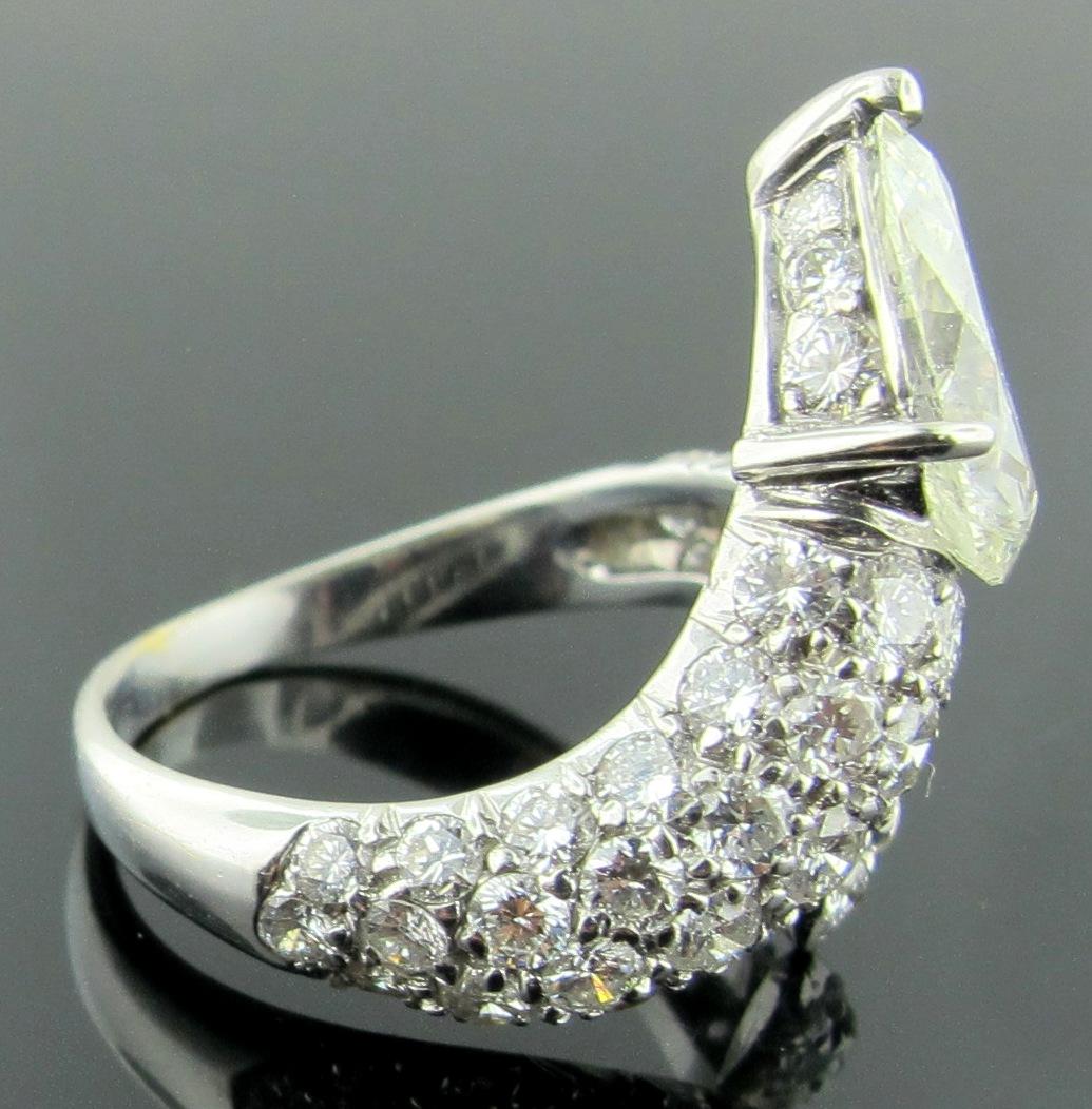 Pear Cut 1.69 Carat Pear Shaped Diamond Ring with 52 Diamonds Swirl Band in 18 Karat Gold For Sale