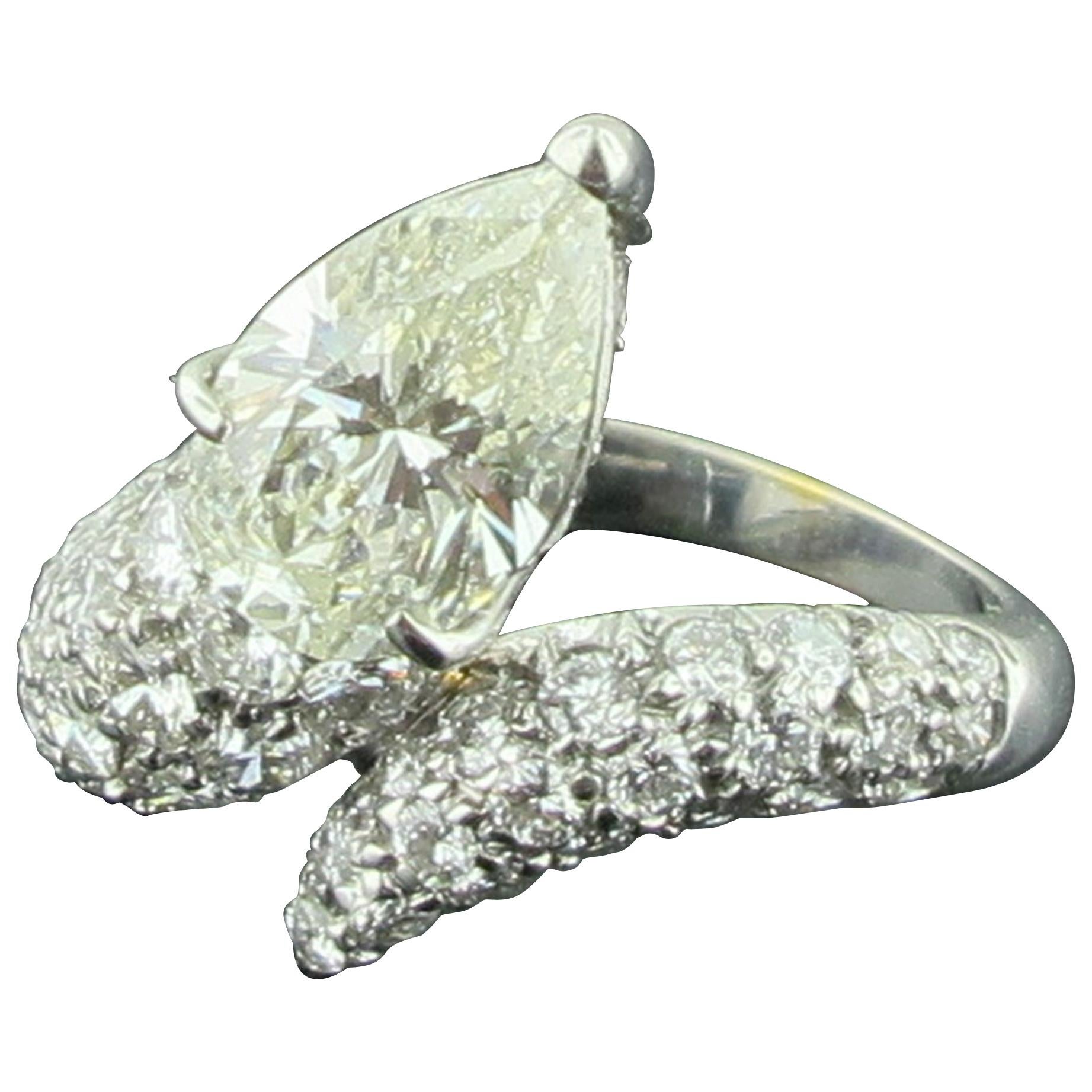 1.69 Carat Pear Shaped Diamond Ring with 52 Diamonds Swirl Band in 18 Karat Gold For Sale