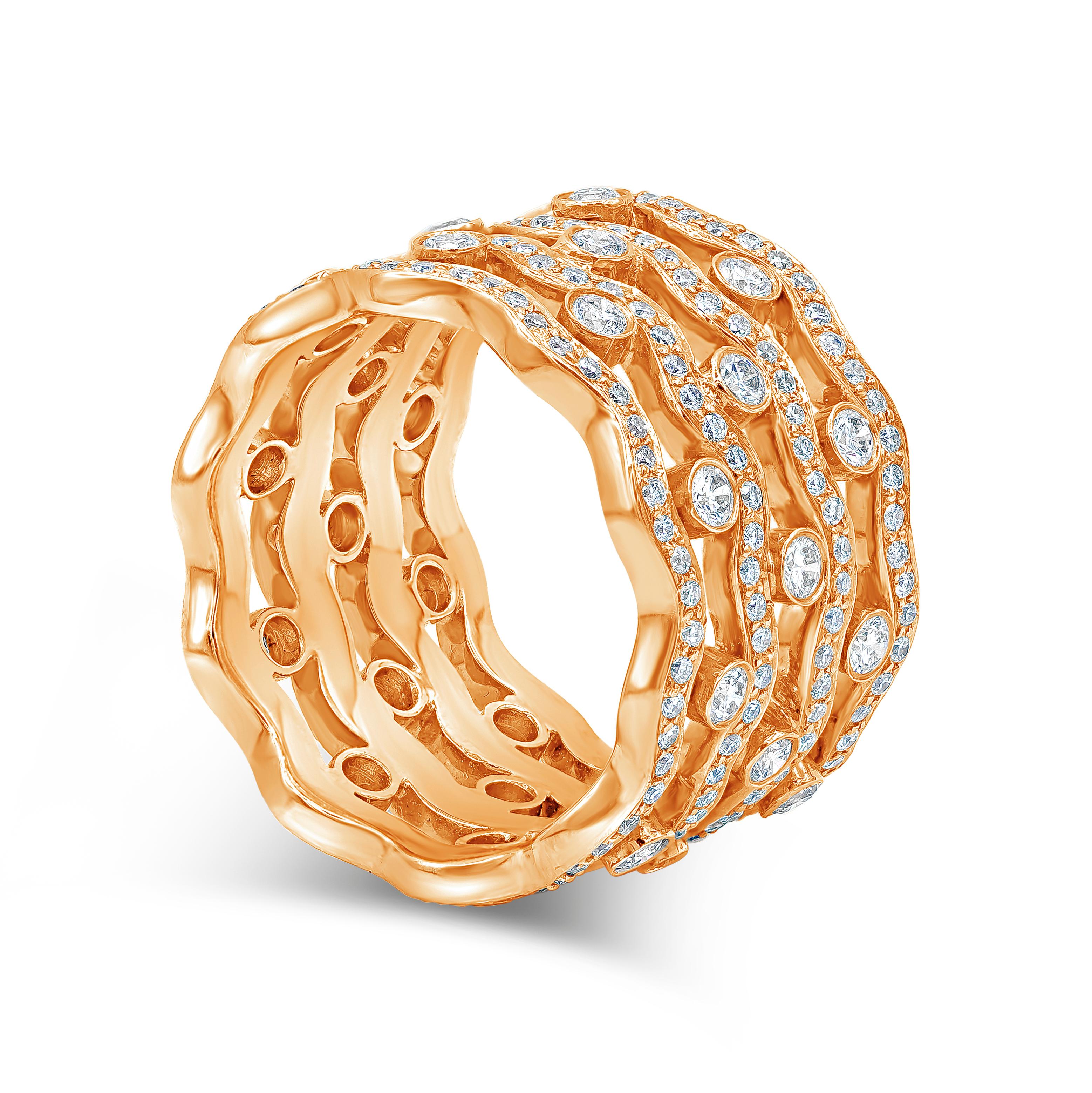 A fashionable and color-rich wide ring showcasing four rows of round brilliant diamonds, set in a wavy pattern. Spacing the rows are evenly-spaced round diamonds in an open-work design. Diamonds weigh 1.69 carats total. Made in 18K Rose Gold, Size