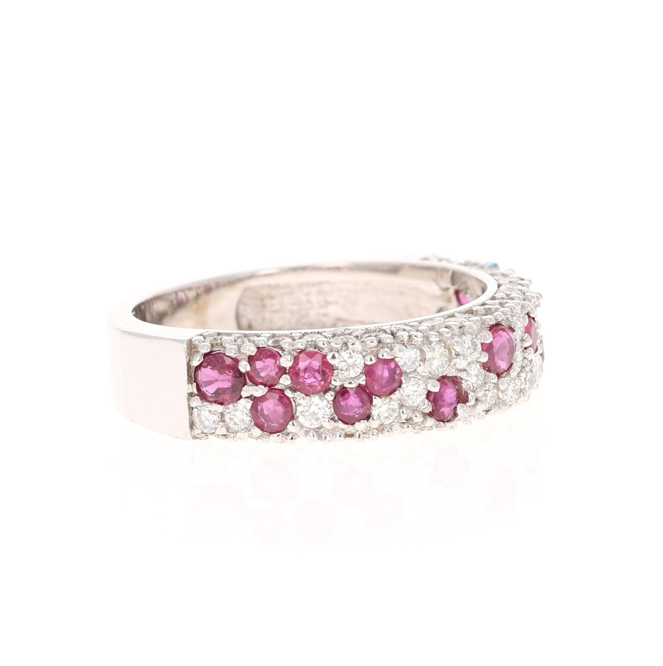 This gorgeous band has 13 Natural Round Cut Rubies that weigh 0.67 carats and 61 Round Cut Diamonds that weigh 0.76 carats. (Clarity: VS, Color: H) The total carat weight of the ring is 1.43 carats. 

The ring is designed in 18 Karat White Gold and