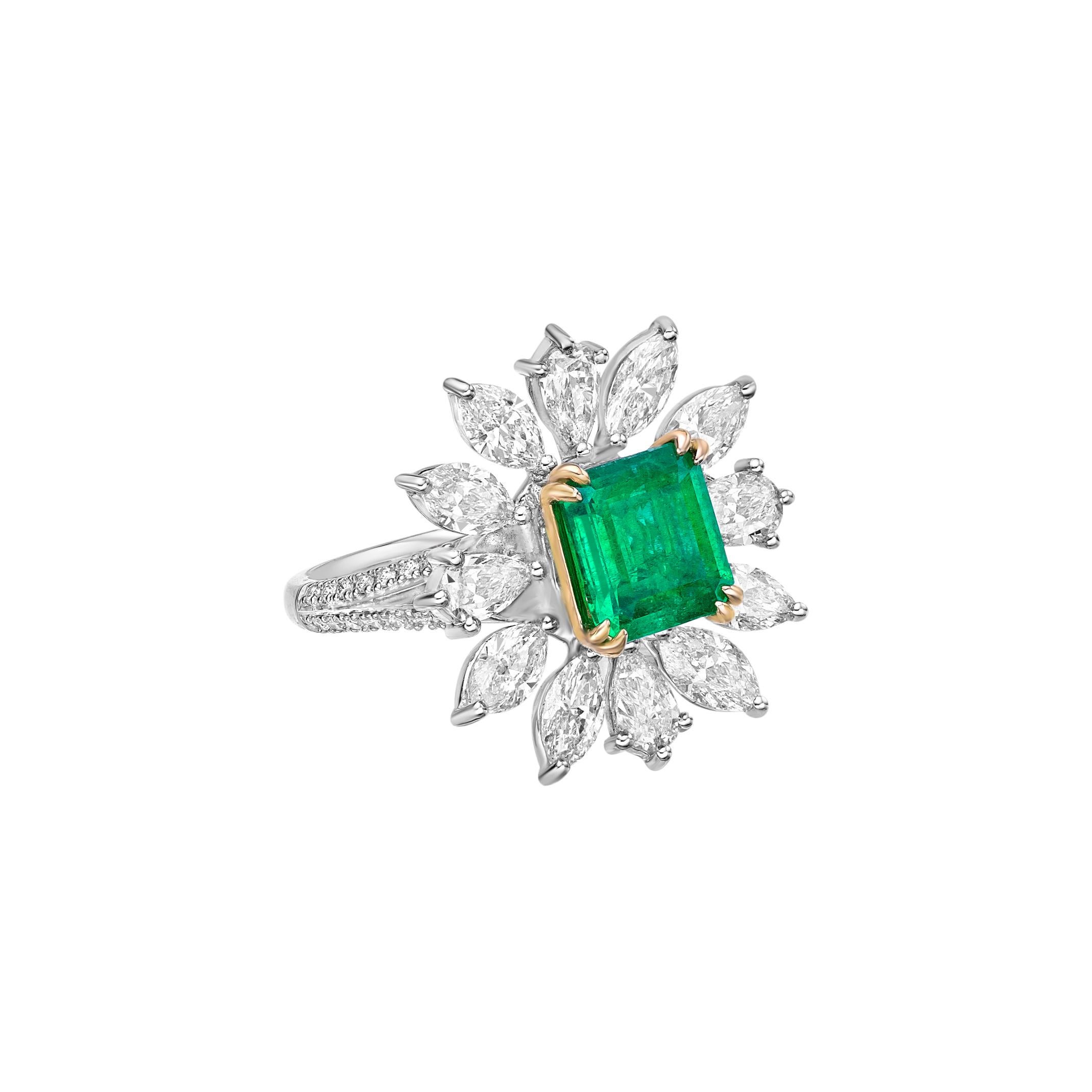 Sunflower Emeralds by Sunita Nahata Fine Design. This collection showcases brilliant green emeralds set on a bed of beautiful white diamonds set in white yellow gold. This is a small and delicate bridal ring that yet emanates glamour and