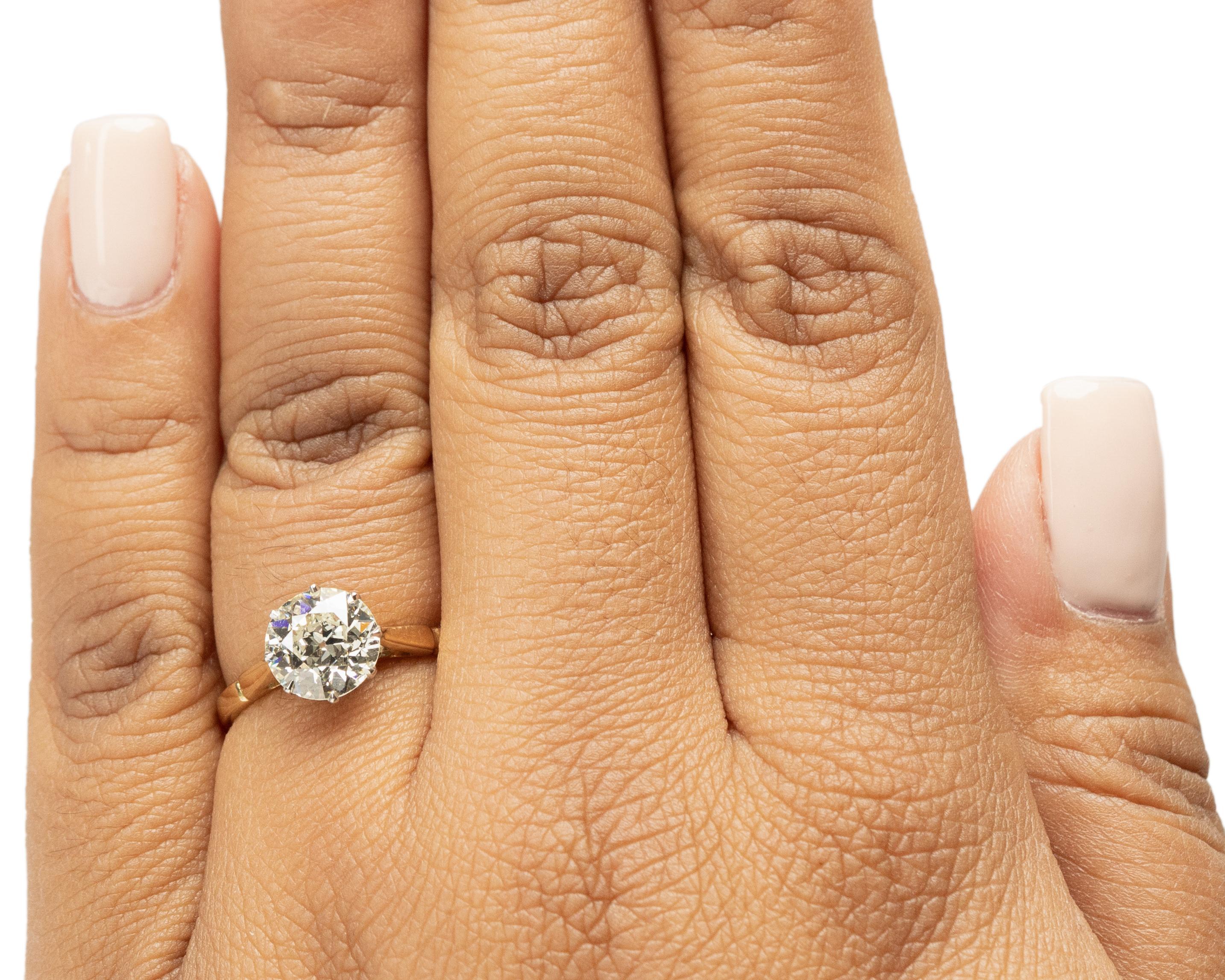 1.69 Carat Total Weight Edwardian Diamond Platinum 18K Gold Engagement Ring In Good Condition For Sale In Atlanta, GA