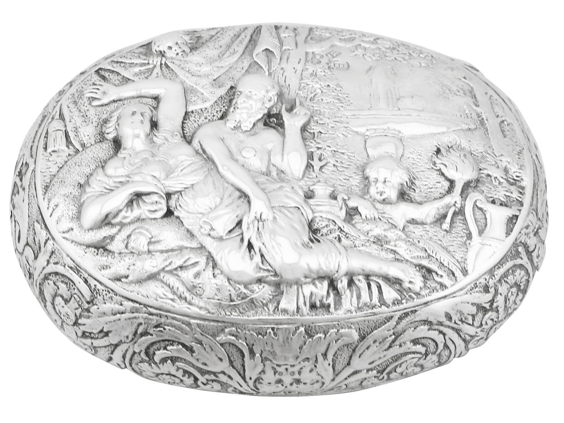 A magnificent, exceptional, fine and impressive, rare antique 17th century Dutch silver tobacco box; an addition to our smoking related silverware collection.

This exceptional antique Dutch silver tobacco box has an oval rounded form.

The