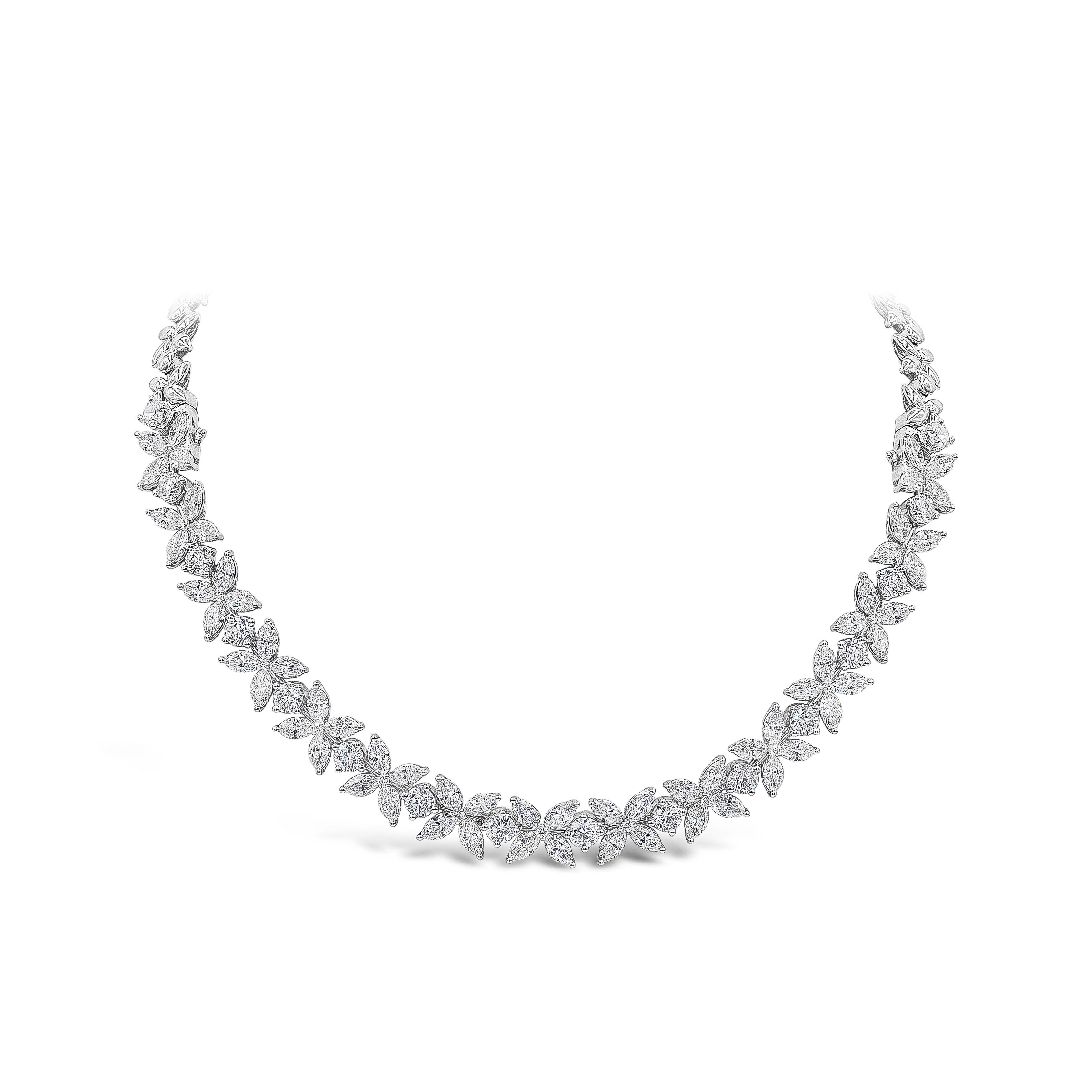 A beautiful floral motif necklace that can be disassembled to two flower bracelets. Showcases a cluster of marquise and round brilliant diamonds, set half-way throughout the necklace. Made in 18K white gold. Diamonds weighs 16.92 carats