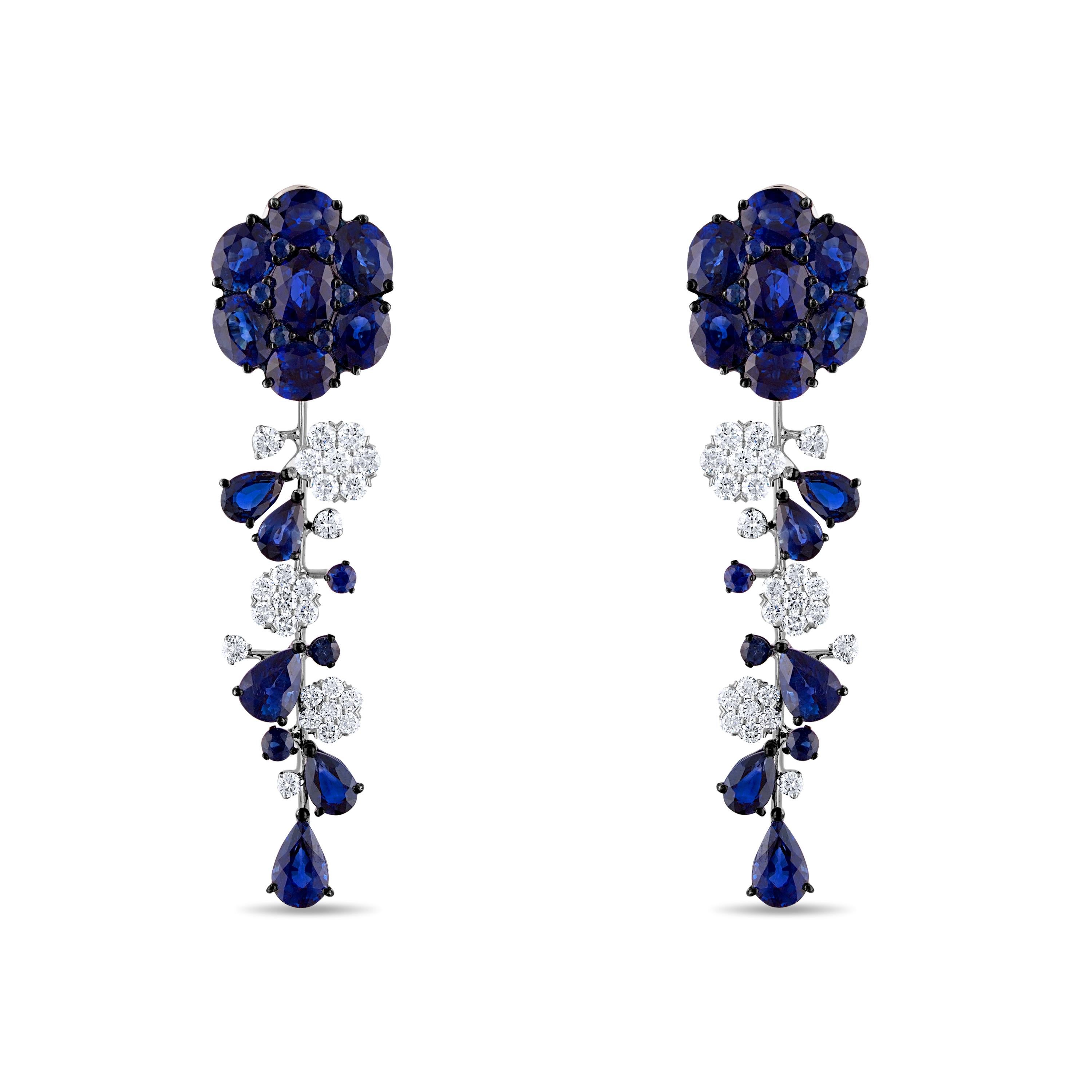 16.93 Carat Natural Royal Blue Sapphire and White Diamond Cascade Gold Earrings:

A gorgeous pair of earrings, it features numerous natural oval and pear-cut 
