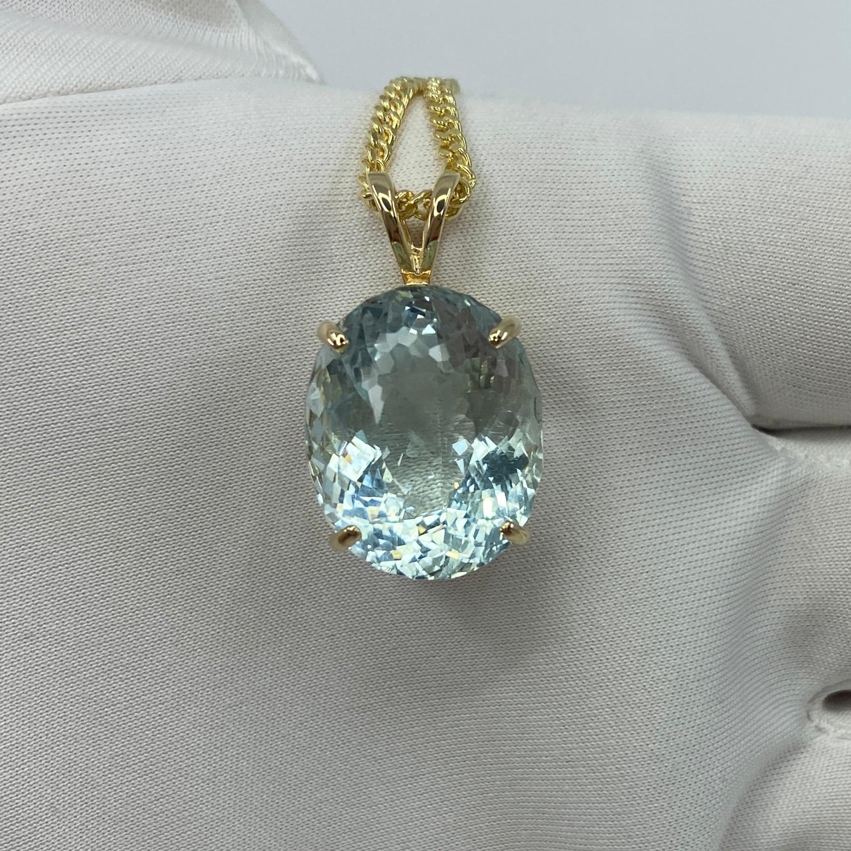 Large Fine Natural Blue Aquamarine Pendant Necklace.

16.94 Carat Aquamarine with a stunning bright blue colour and excellent clarity, set in a fine 14k yellow gold solitaire pendant.
The aquamarine also has an excellent fancy oval cut showing lots