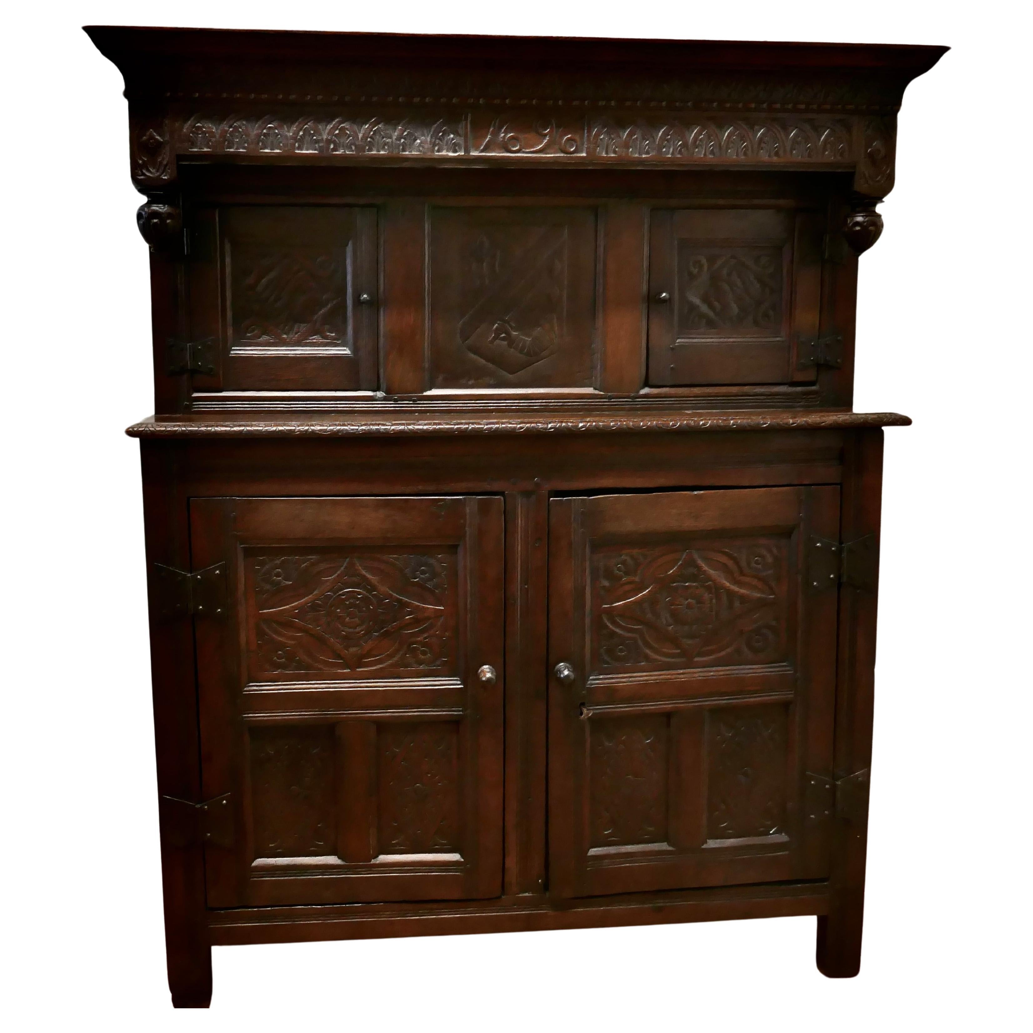 1696 French Carved Oak Court Cupboard, Cottage size Livery Cupboard     For Sale
