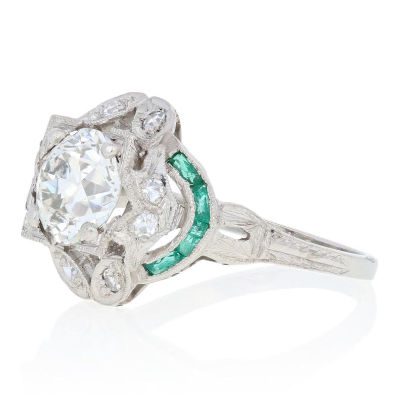 This ring is a size 6.

Era: Art Deco 1920s - 1930s

Metal Content: Guaranteed Platinum as stamped

Stone Information: 
Natural Diamonds  
Clarity: VVS2 (solitaire); VS1 - VS2 (accents) 
Color: K (solitaire); H - I (accents)    
Cuts: European