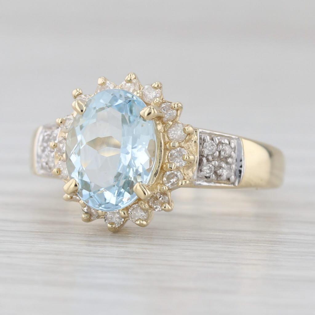 Anello aureolato con diamante e acquamarina ovale da 1,69 carati in oro giallo 14k, misura 6 in vendita 1