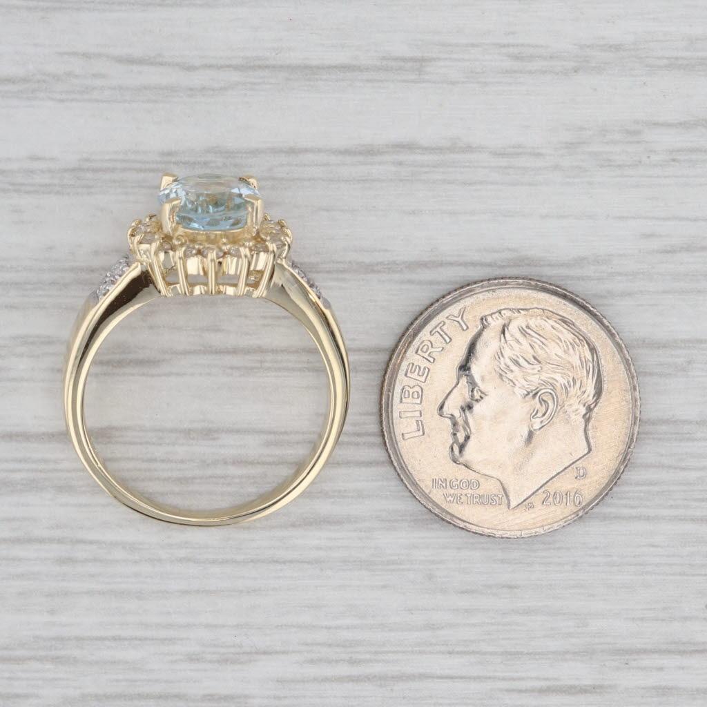 Anello aureolato con diamante e acquamarina ovale da 1,69 carati in oro giallo 14k, misura 6 in vendita 2