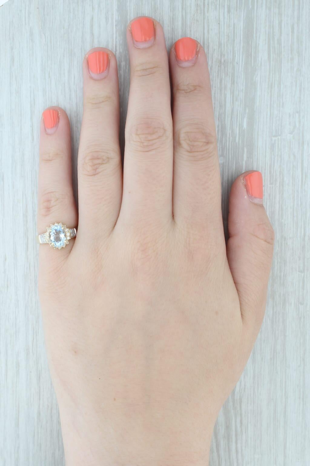 Anello aureolato con diamante e acquamarina ovale da 1,69 carati in oro giallo 14k, misura 6 in vendita 4