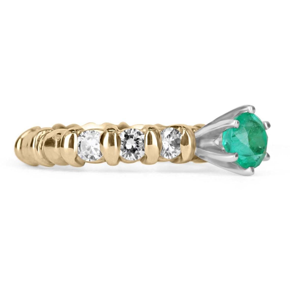 Elegantly displayed is a 1.69 Carats stylish round Colombian emerald and round diamond engagement/cocktail ring yellow gold 18K. This romantic piece is captivating from every angle and catches your eye at the very first glimpse. The center features