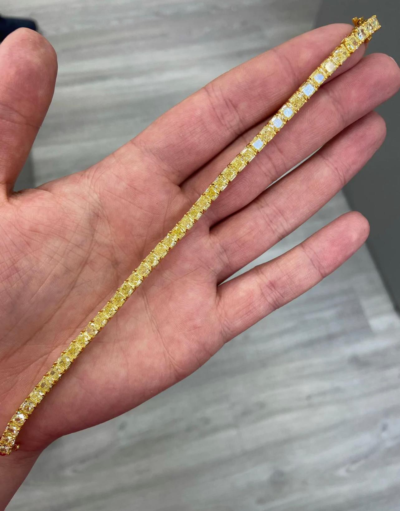 Our gorgeous and well made Tennis bracelet with meticulously matched Fancy Intense Yellow Cushions 16.08ct 43 pieces
VS quality
Set in 18kt Yellow Gold
4 prong style
7 inch 