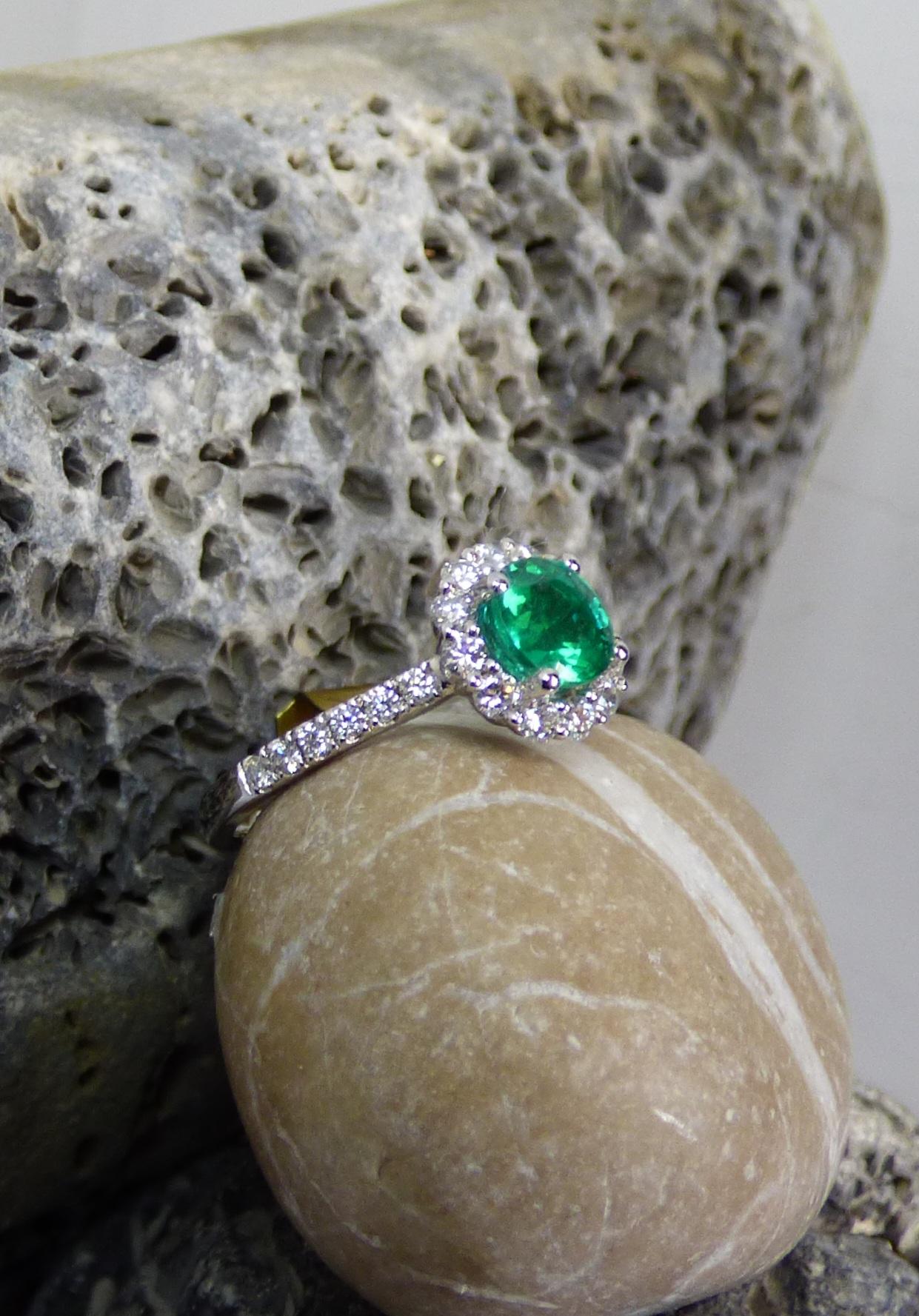Modern 1.6ct. Round Emerald and Diamond Cluster Ring in Platinum For Sale