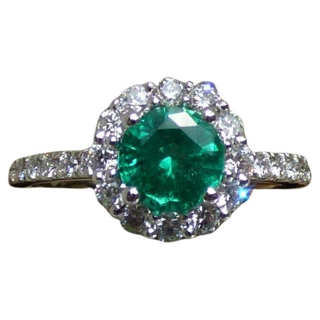 1.6ct. Round Emerald and Diamond Cluster Ring in Platinum For Sale