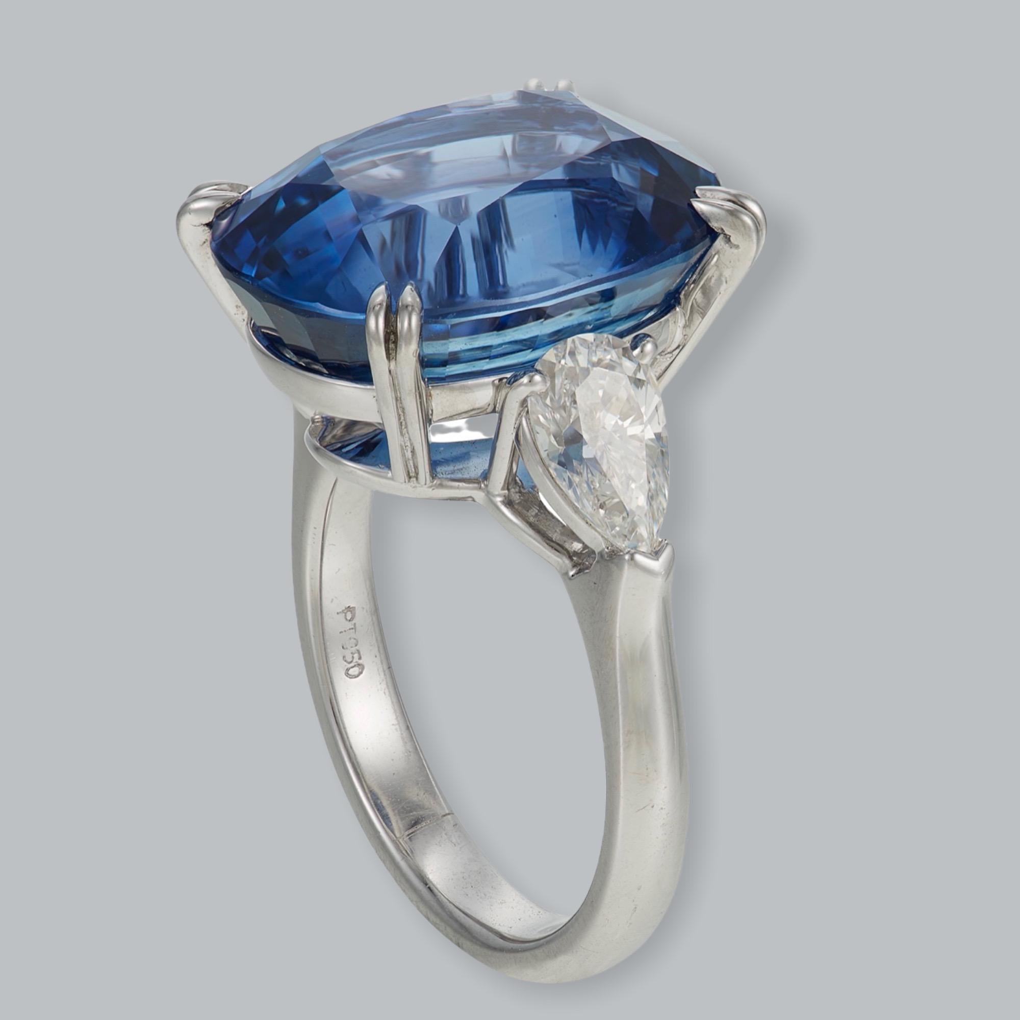 Stunning 16.12ct mixed oval cut sapphire from Sri Lanka accented with 1.20cts of pear shaped diamonds beautifully set in platinum. Wear this on your right or left hand and it will be a show stopper.