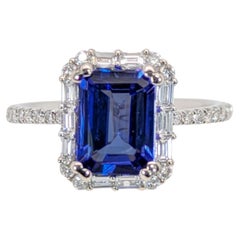 Anillo de tanzanita de 1,6 ct con halo de diamantes mixtos en oro blanco macizo de 14 quilates  EM 8x6mm