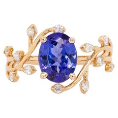 Anello con tanzanite da 1,6 carati e accenti di diamanti Nature: Oro massiccio 14k, ovale 9x7 mm