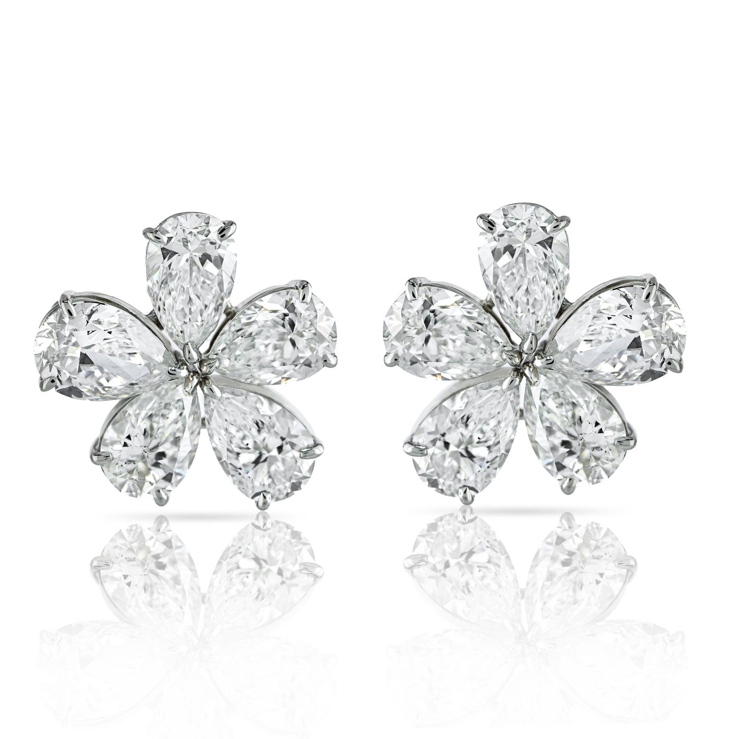 Adorn yourself with the epitome of elegance and luxury – the 16.01-carat total weight GIA Certified D-E Color Pear Cut Diamond Flower Stud Earrings. Crafted with meticulous artistry, these exquisite earrings feature ten pear-shaped diamonds, each