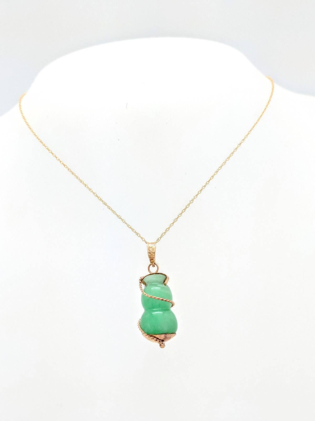 Ladies 16k Yellow Gold Green Jade Pendant Necklace 5.1 Grams

You are viewing a Beautiful Green Jade Pendant Necklace. The pendant is crafted from 16k yellow gold and measures 25mm x 12mm. It hangs beautifully on a 14k yellow gold 18