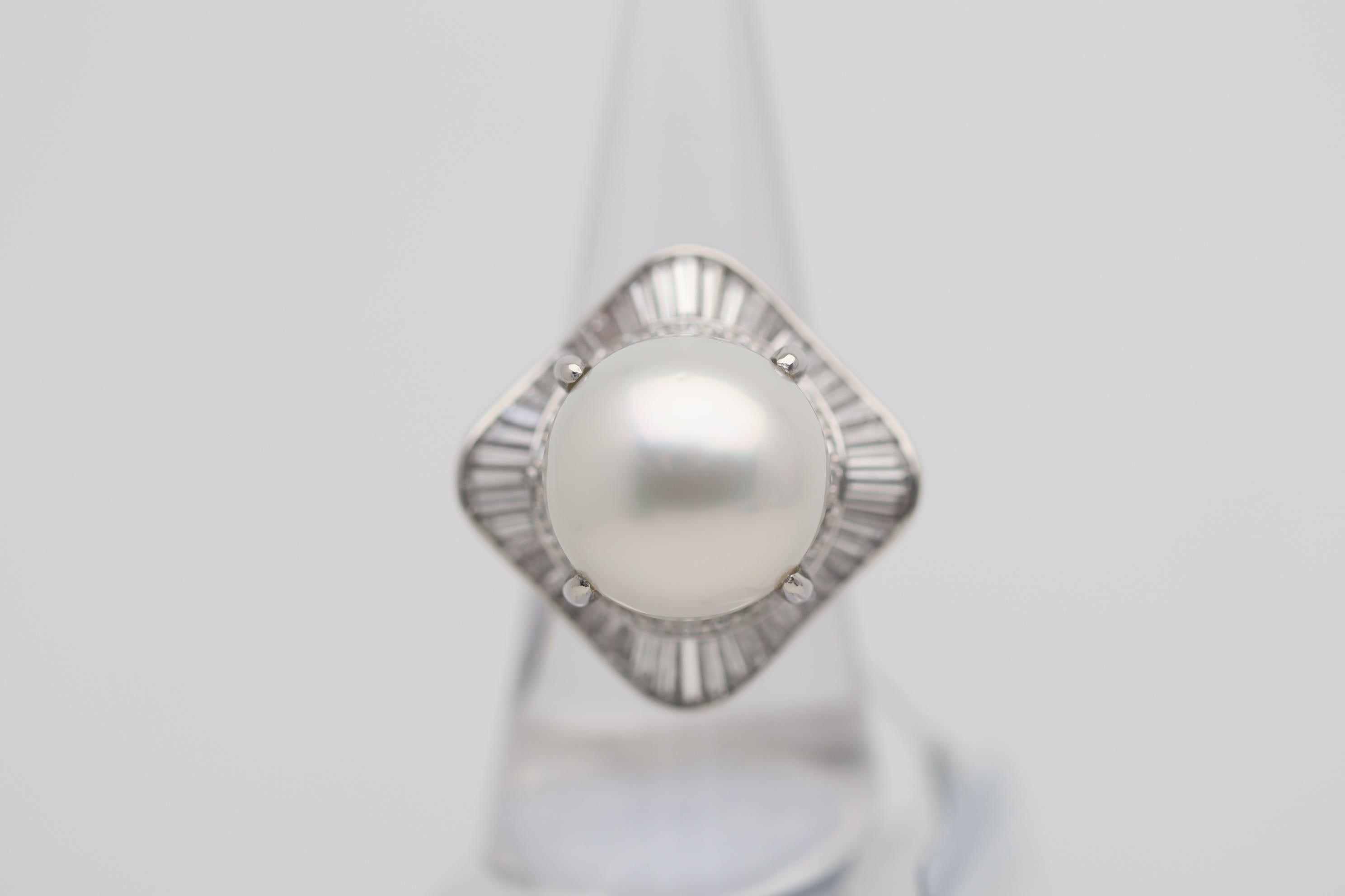 A big and beautiful piece featuring a fine 16mm south sea pearl! What makes the pearl special is its combination of its large size and fine quality. The pearl is perfectly rounded and has excellent luster and nacre quality. It is complemented by