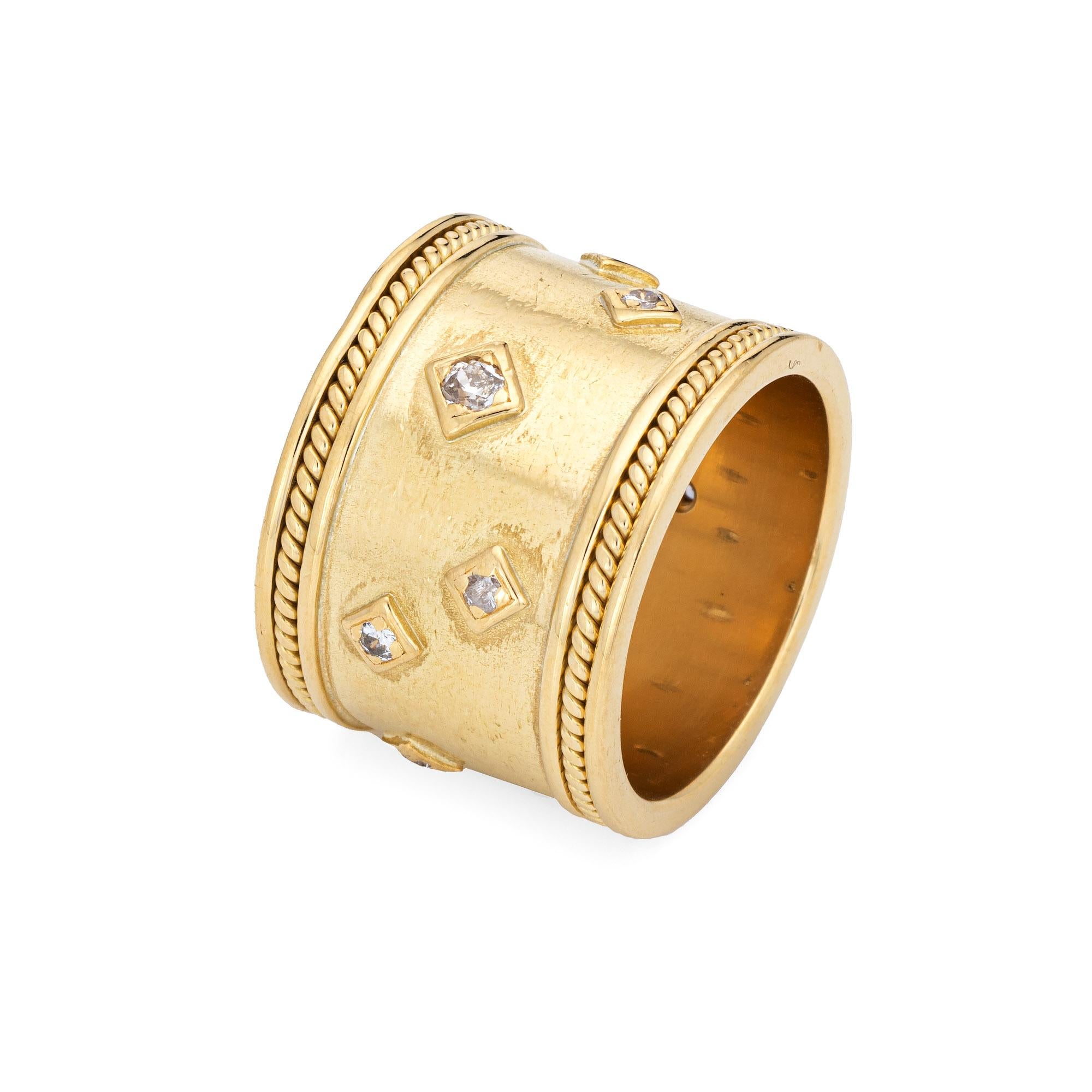 Stylish vintage wide band cigar diamond ring crafted in 18 karat yellow gold. 

Diamonds total an estimated 0.15 carats (estimated at H-I color and SI1-I1 clarity). 

The wide band ring (16mm - 0.62 inches) makes a great statement on the hand. The