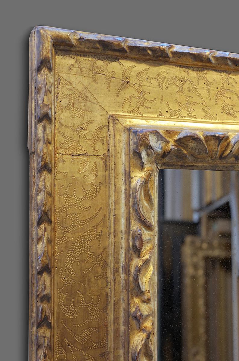 This is one of the jewels from our collection - an absolutely exceptional hand carved late 16th-early 17th century late Renaissance cassetta frame. It has a bolection / architrave profile and carved with bellflowers at sight; undulating blossom and