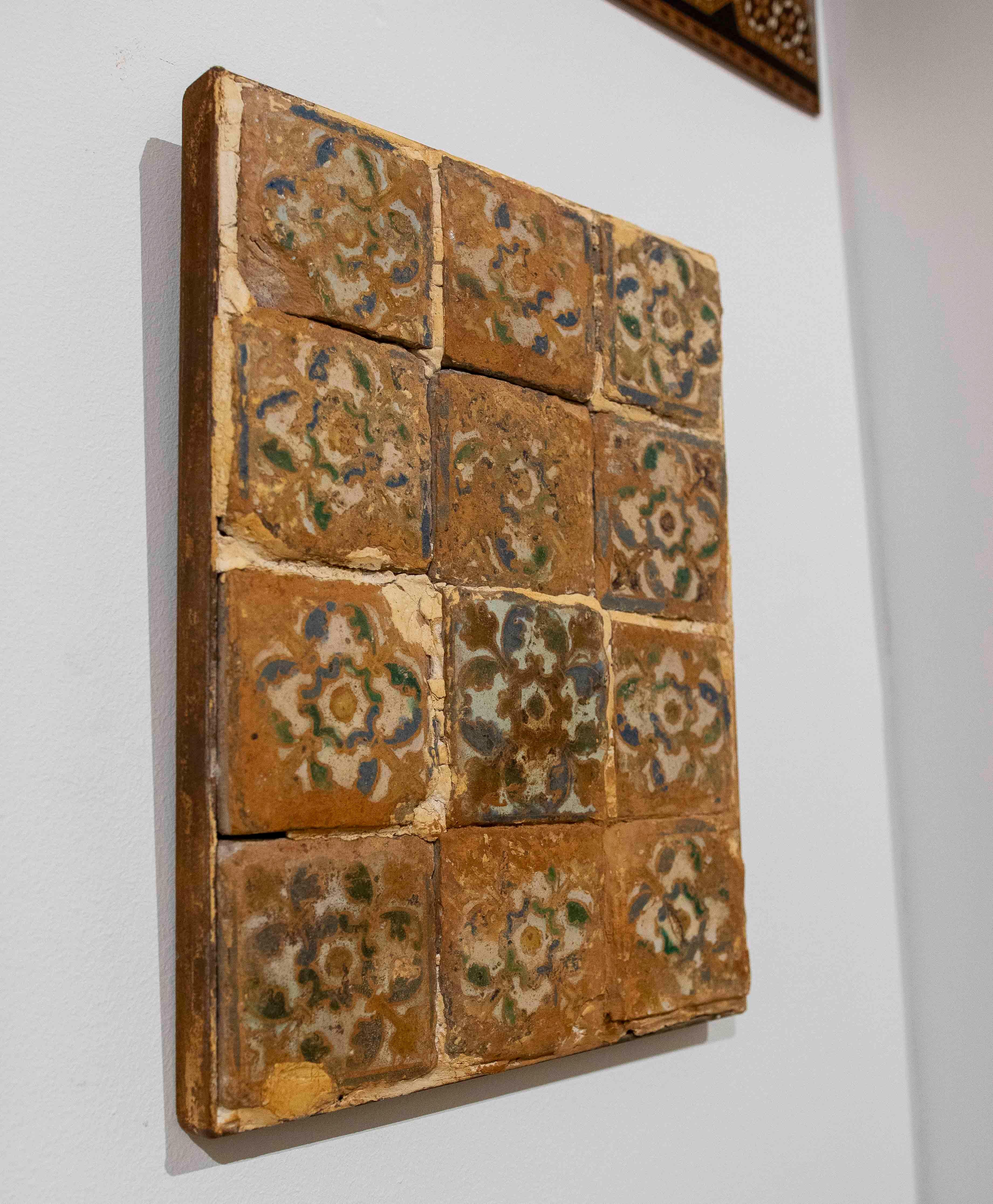 Espagnol 16th Antique Panel of Twelve Antique Tiles with Floral Motifs en vente